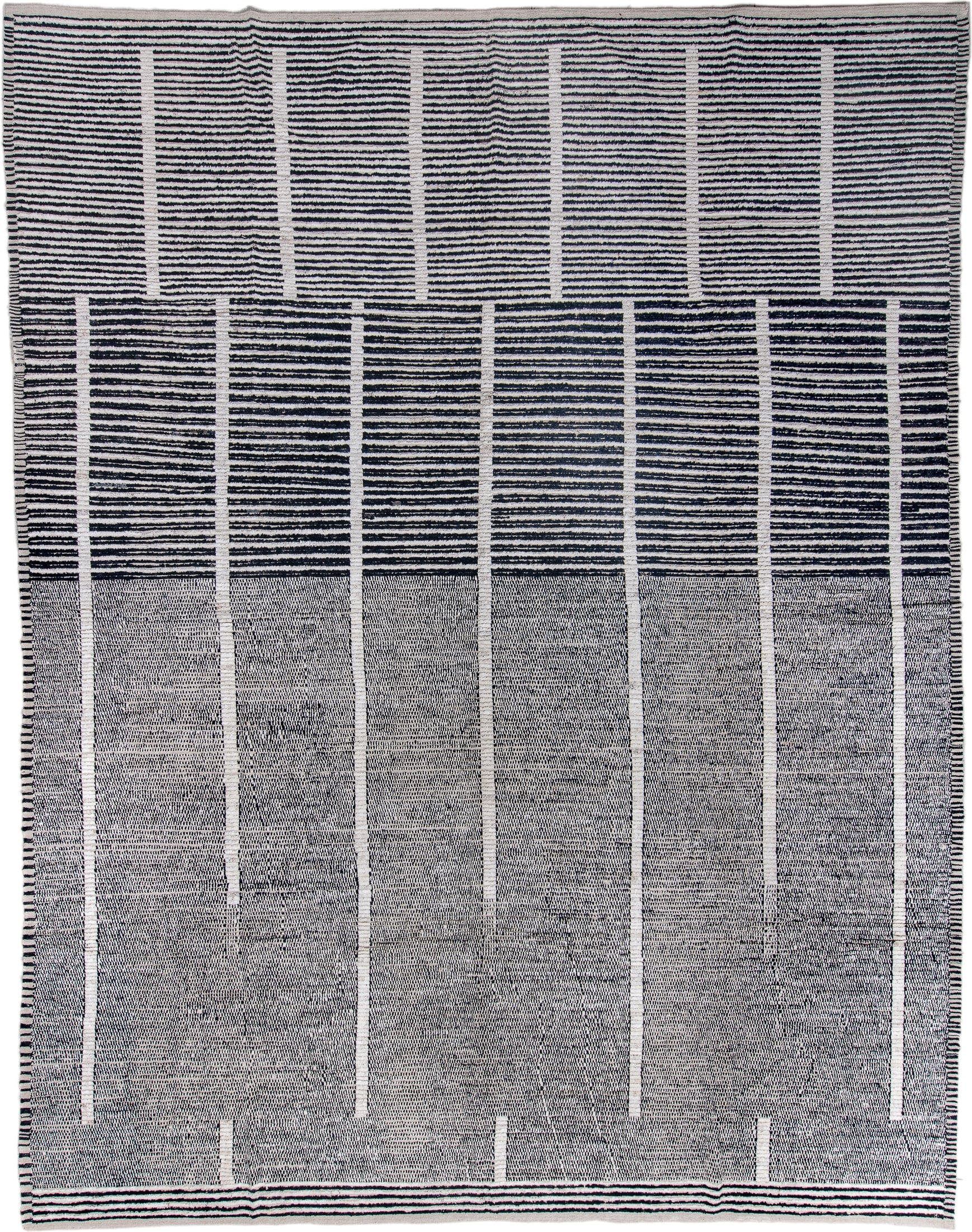 13' x 16' one-of-a-kind handmade vintage Tulu oversize rug. Color palette: ivory, charcoal, gray, black