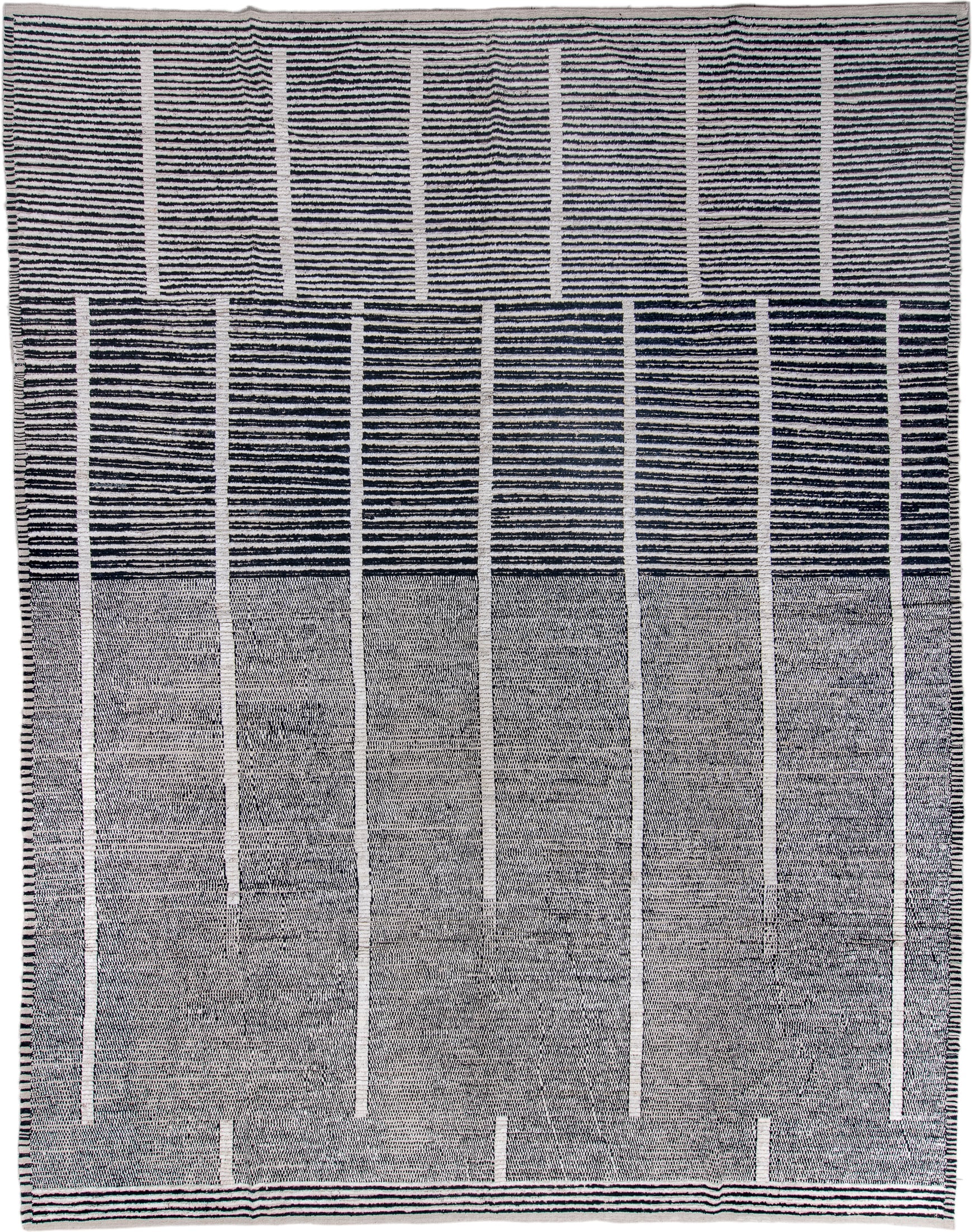 13' x 16' one-of-a-kind handmade vintage Tulu oversize rug. Color palette: ivory, charcoal, gray, black