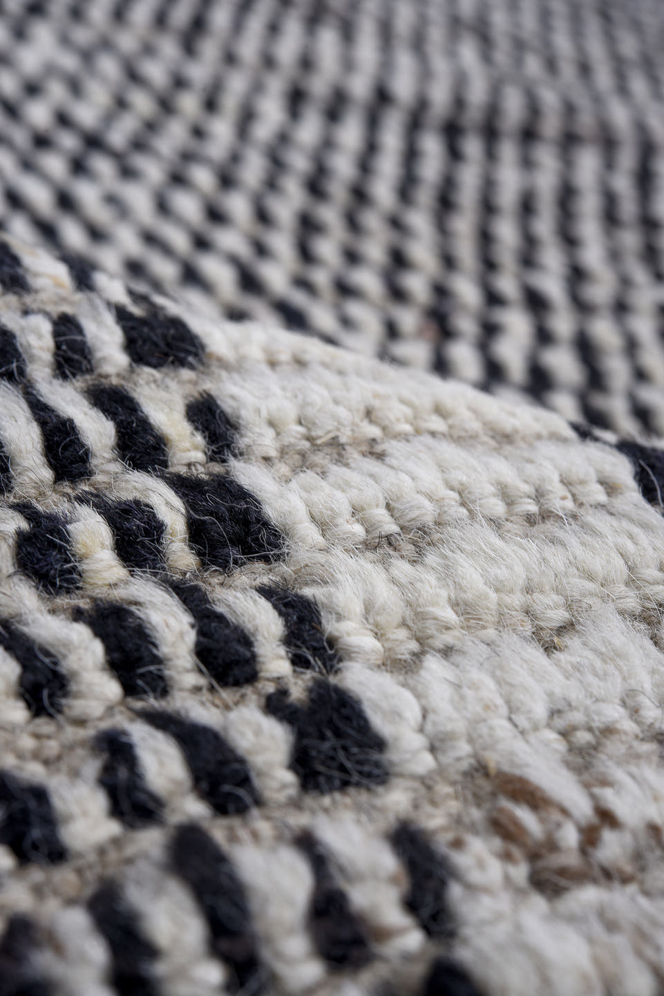 13' x 16' one-of-a-kind handmade vintage Tulu oversize rug. Color palette: ivory, charcoal, gray, black