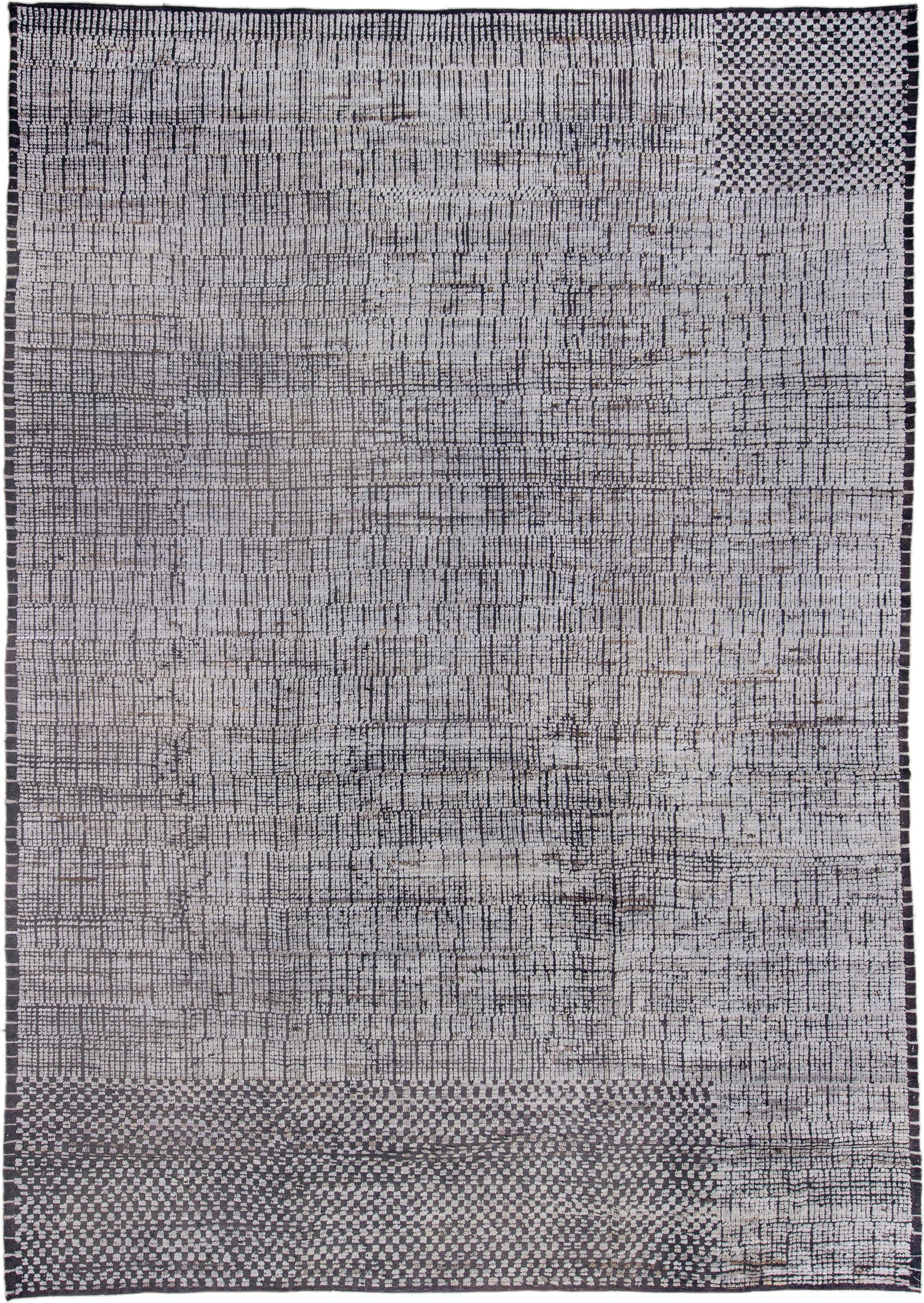 9' x 13' one-of-a-kind handmade vintage Tulu large size rug. Color palette: ivory, charcoal, black, gray