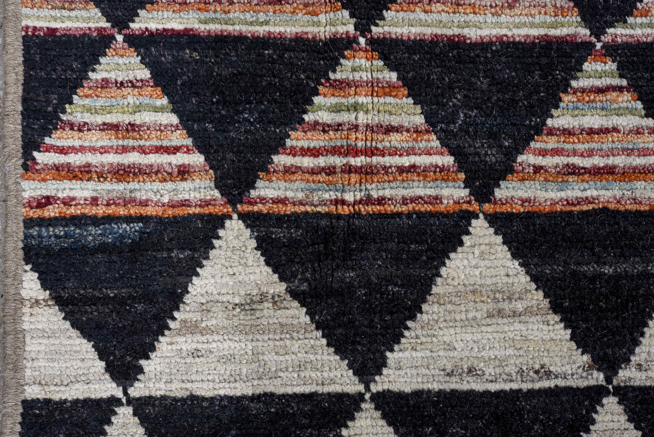 9' x 12' one-of-a-kind handmade vintage Tulu large size rug. Color palette: charcoal, ivory, rose, blush, rust, taupe, gray