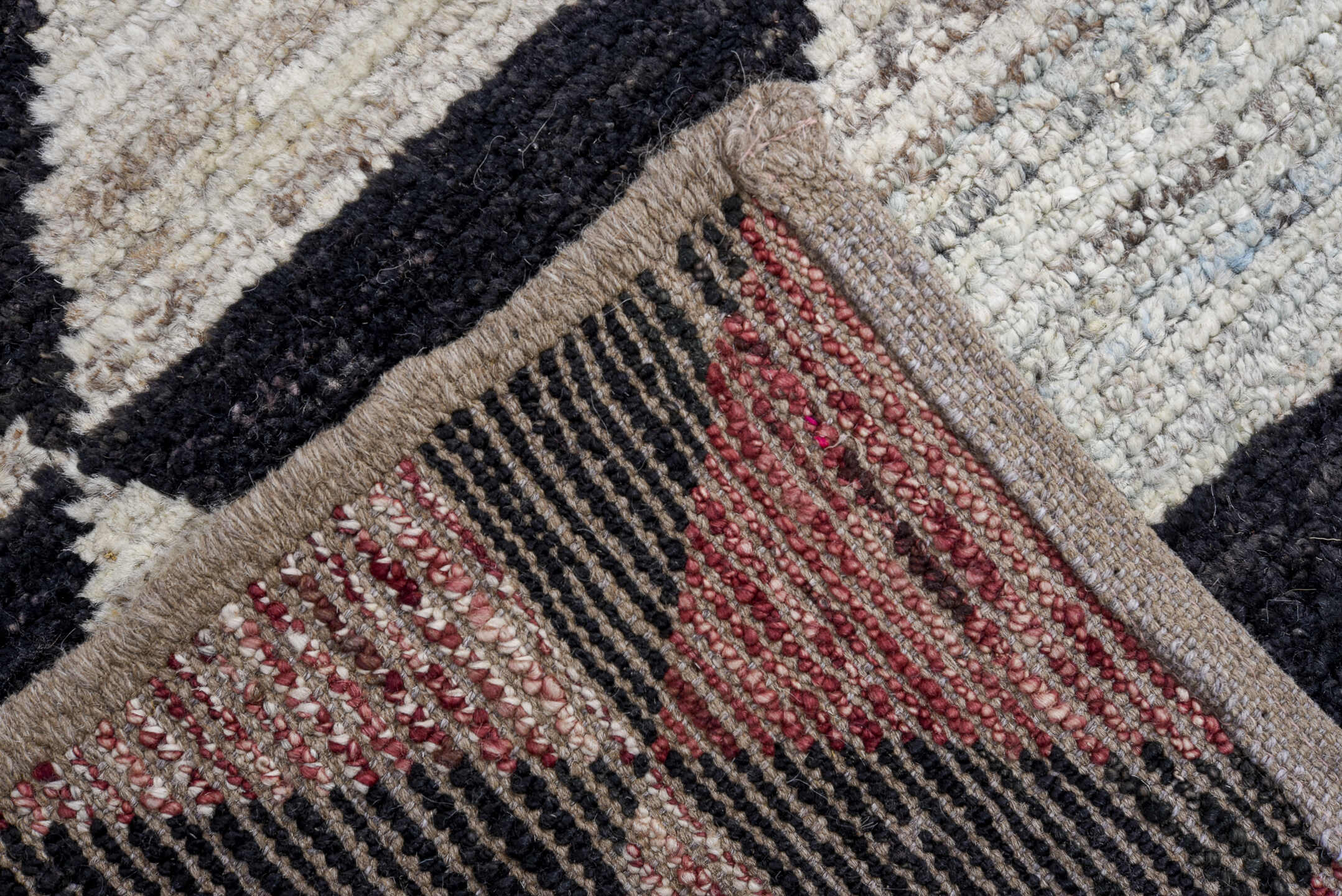 9' x 12' one-of-a-kind handmade vintage Tulu large size rug. Color palette: charcoal, ivory, rose, blush, rust, taupe, gray