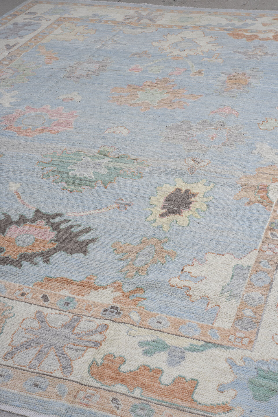 9' x 12' one-of-a-kind handmade vintage Oushak large size rug. Color palette: sky blue, ivory, beige, sage, slate