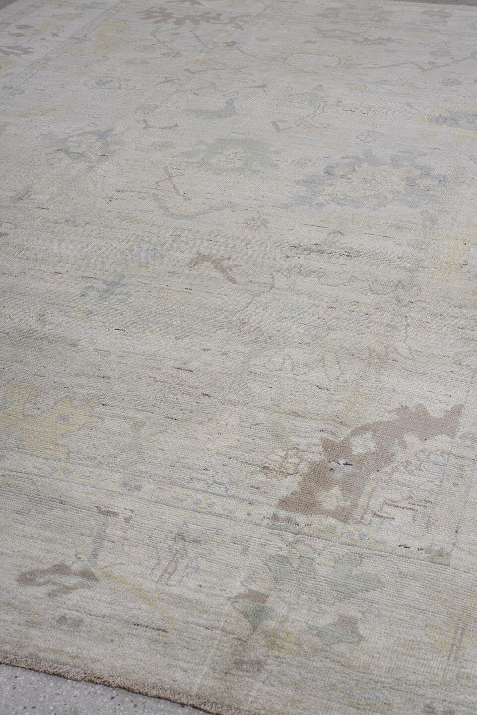 8' x 13' one-of-a-kind handmade vintage Oushak large size rug. Color palette: ivory, pale blue, taupe, sage, cream
