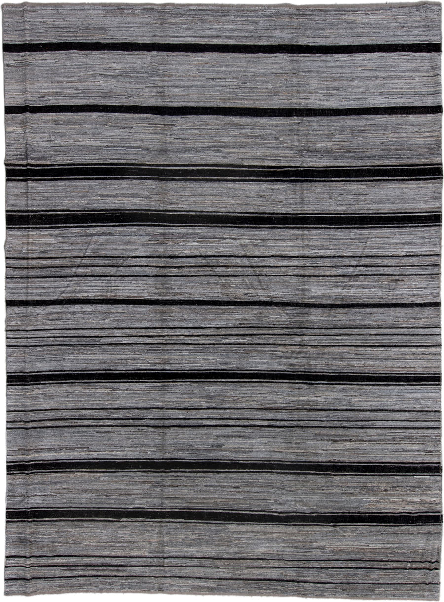 10' x 13' one-of-a-kind handmade vintage Tulu large size rug. Color palette: gray, charcoal, ivory, black