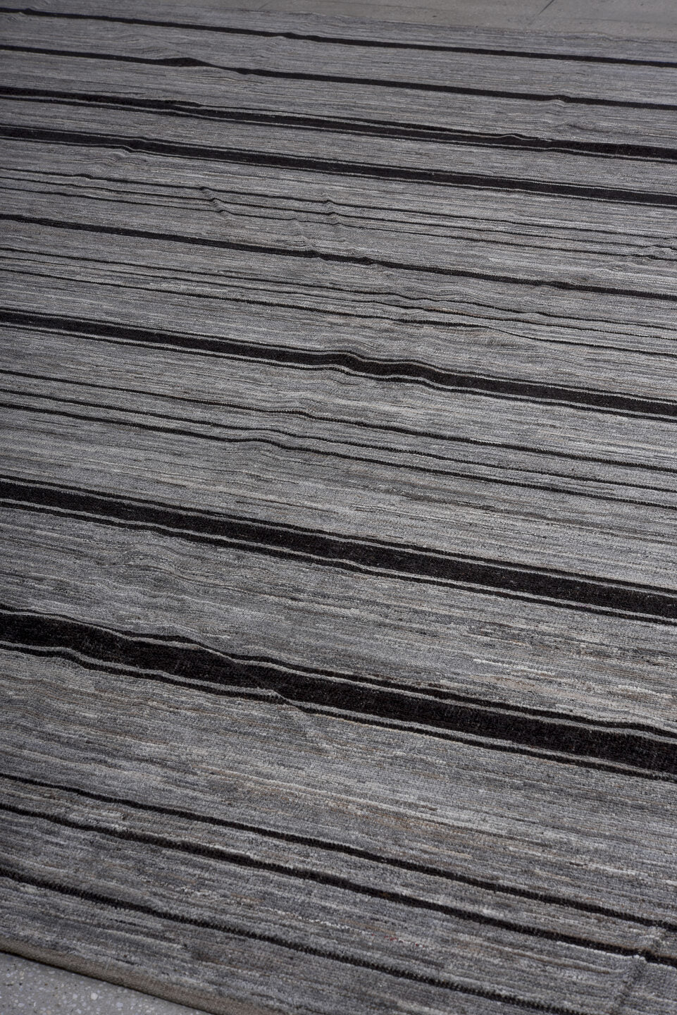 10' x 13' one-of-a-kind handmade vintage Tulu large size rug. Color palette: gray, charcoal, ivory, black