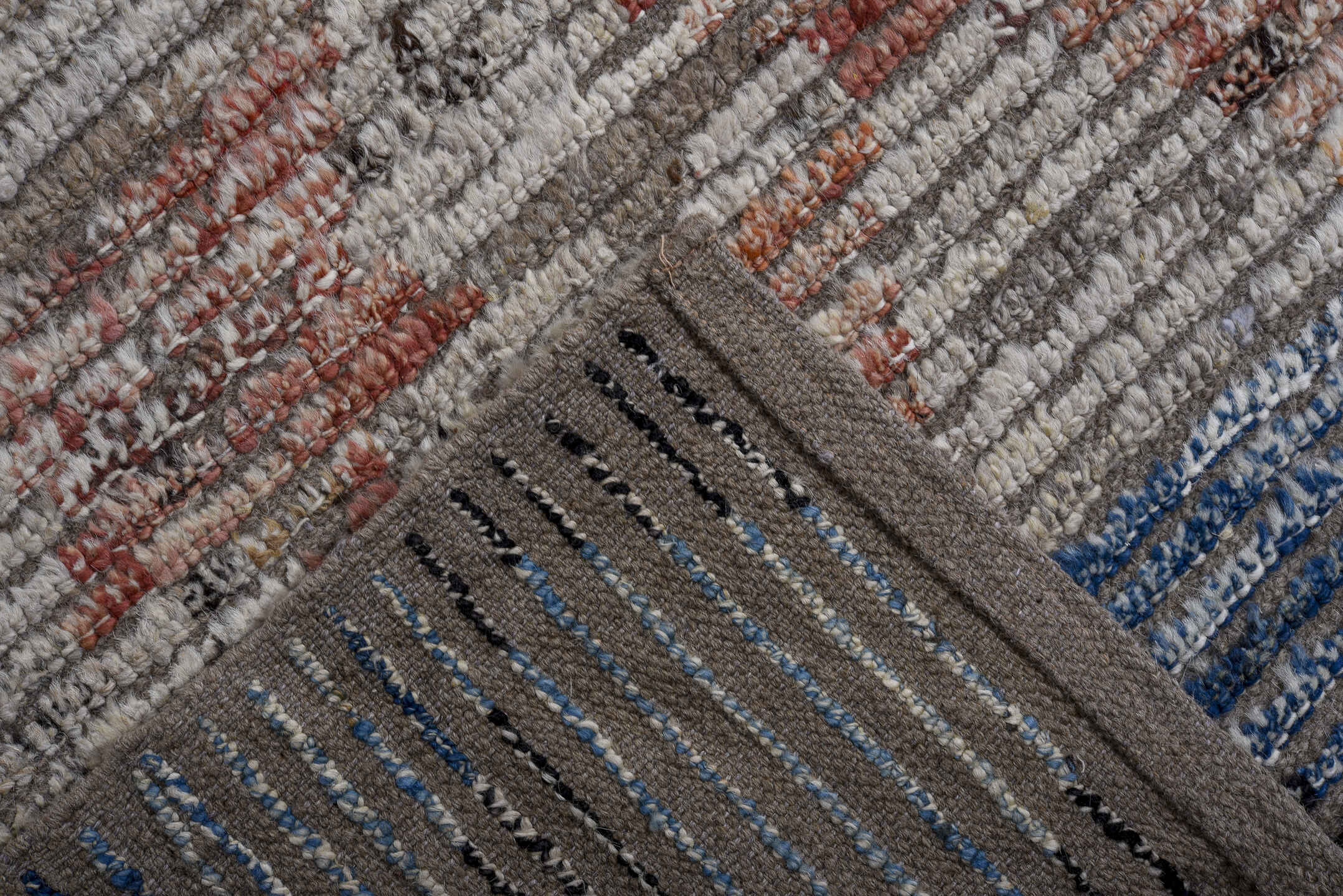 9' x 12' one-of-a-kind handmade vintage Tulu large size rug. Color palette: ivory, blue, charcoal, slate, rust, taupe