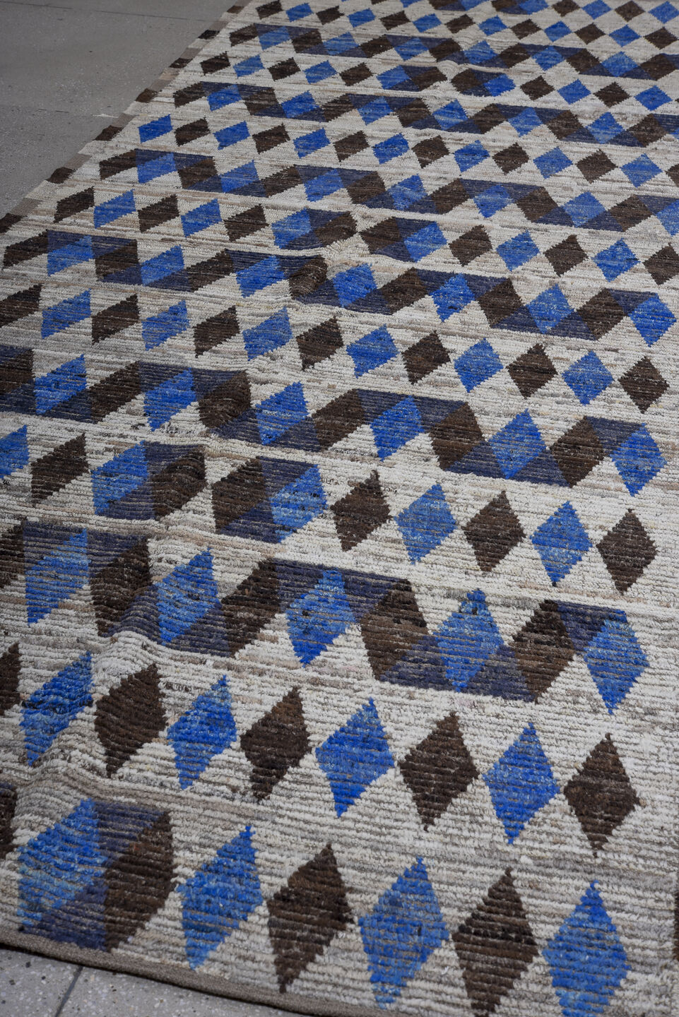 5' x 14' one-of-a-kind handmade vintage Tulu rug. Color palette: ivory, charcoal, cobalt, slate, taupe, gray, black, blue