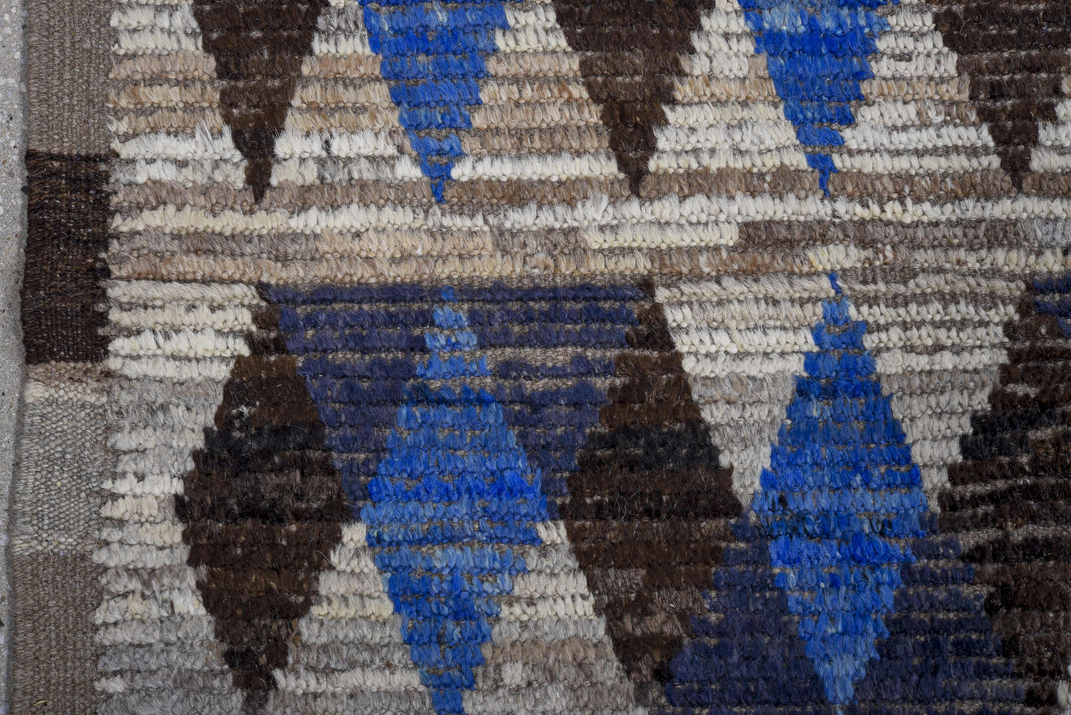 5' x 14' one-of-a-kind handmade vintage Tulu rug. Color palette: ivory, charcoal, cobalt, slate, taupe, gray, black, blue