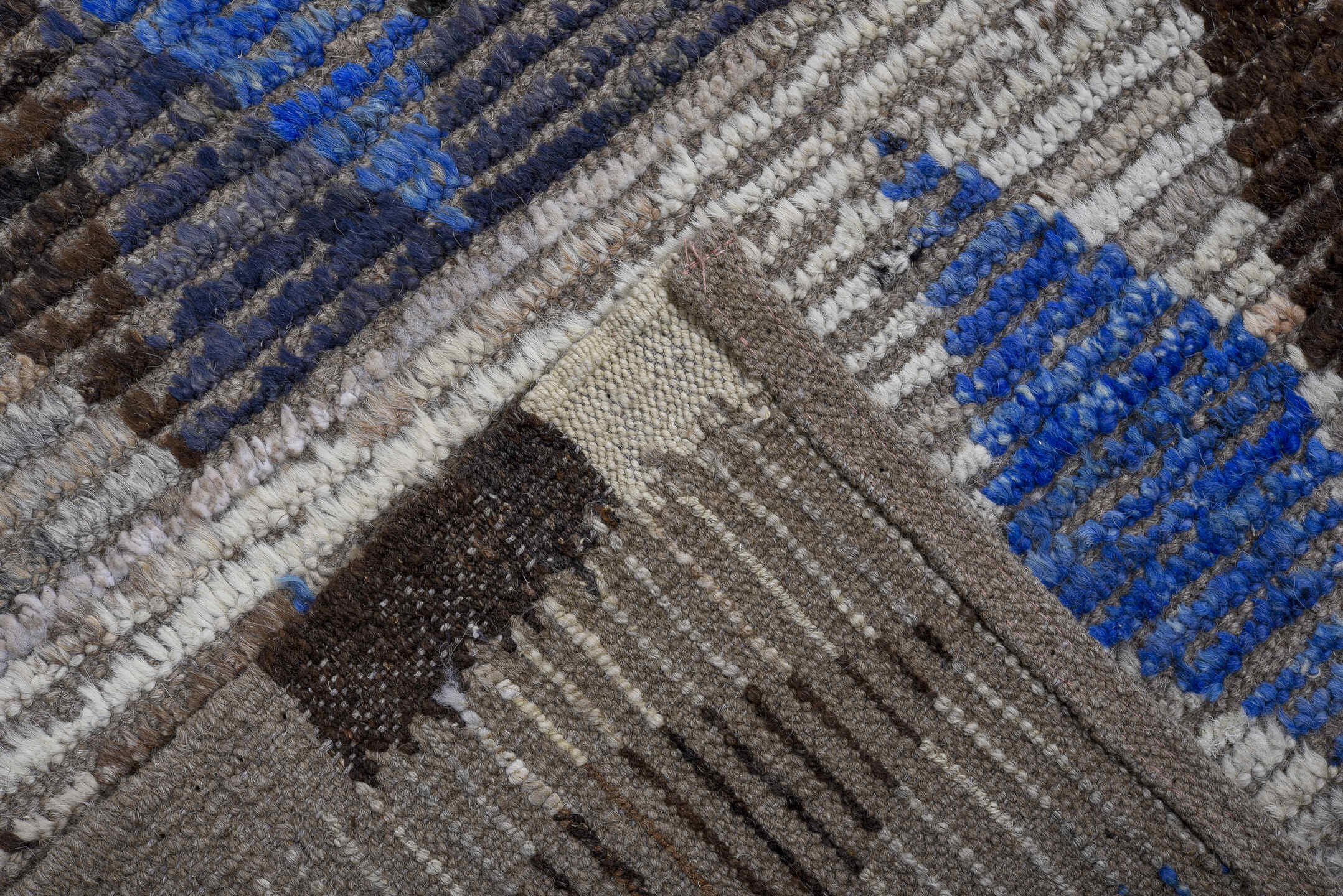 5' x 14' one-of-a-kind handmade vintage Tulu rug. Color palette: ivory, charcoal, cobalt, slate, taupe, gray, black, blue