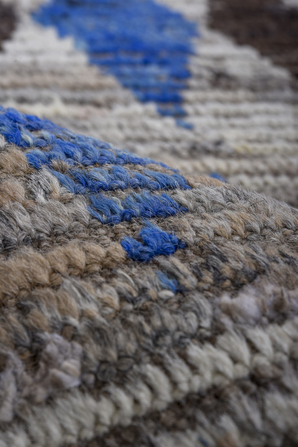 5' x 14' one-of-a-kind handmade vintage Tulu rug. Color palette: ivory, charcoal, cobalt, slate, taupe, gray, black, blue