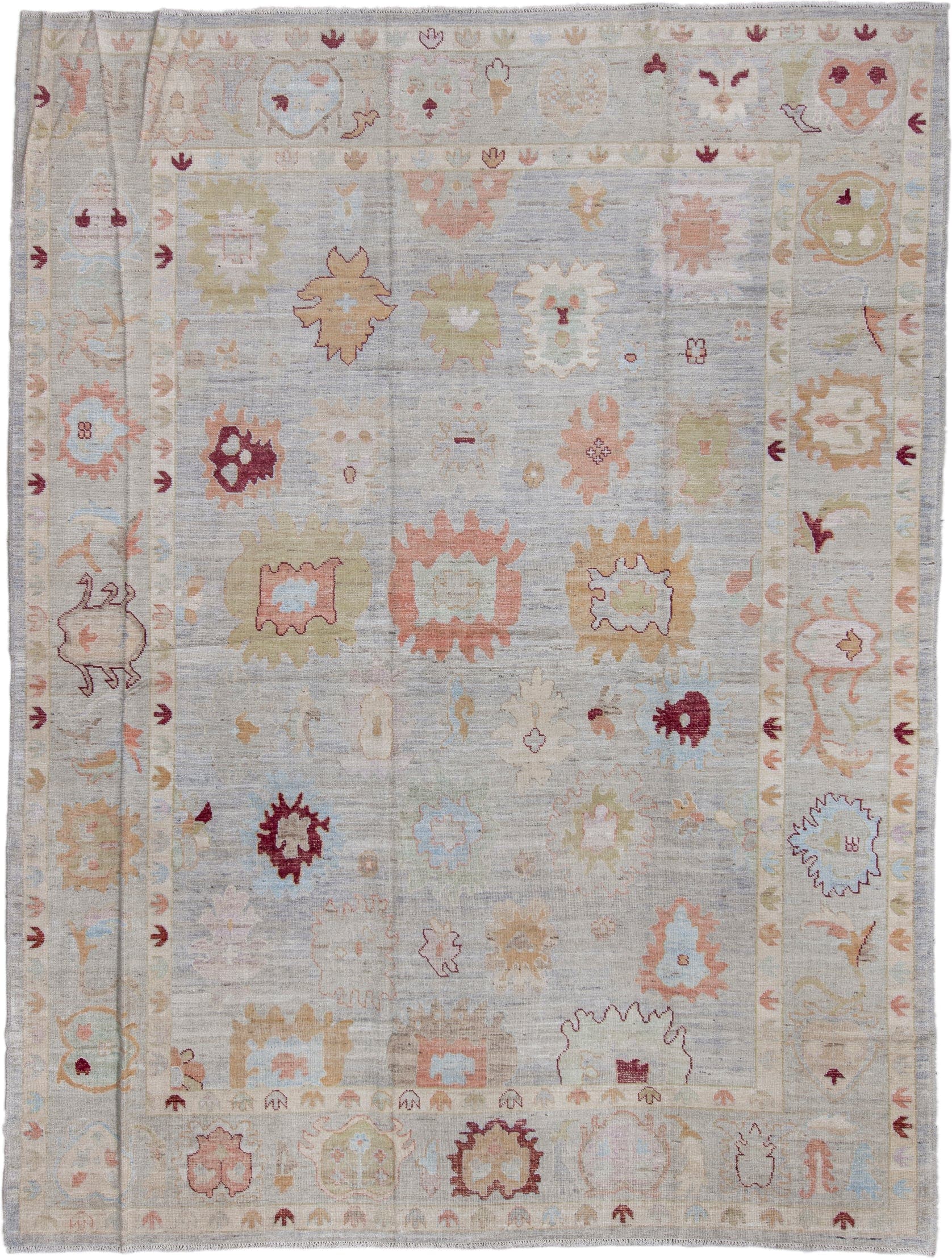 10' x 13' one-of-a-kind handmade vintage Oushak large size rug. Color palette: pale blue, ivory, blush, sage, gold, burgundy