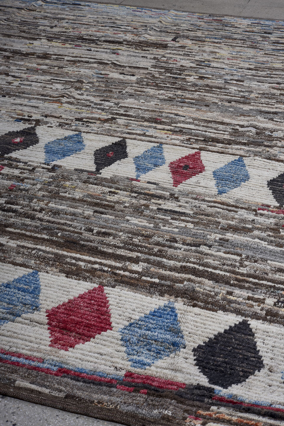 11' x 13' one-of-a-kind handmade vintage Tulu oversize rug. Color palette: brown, ivory, charcoal, sky blue, crimson, gray