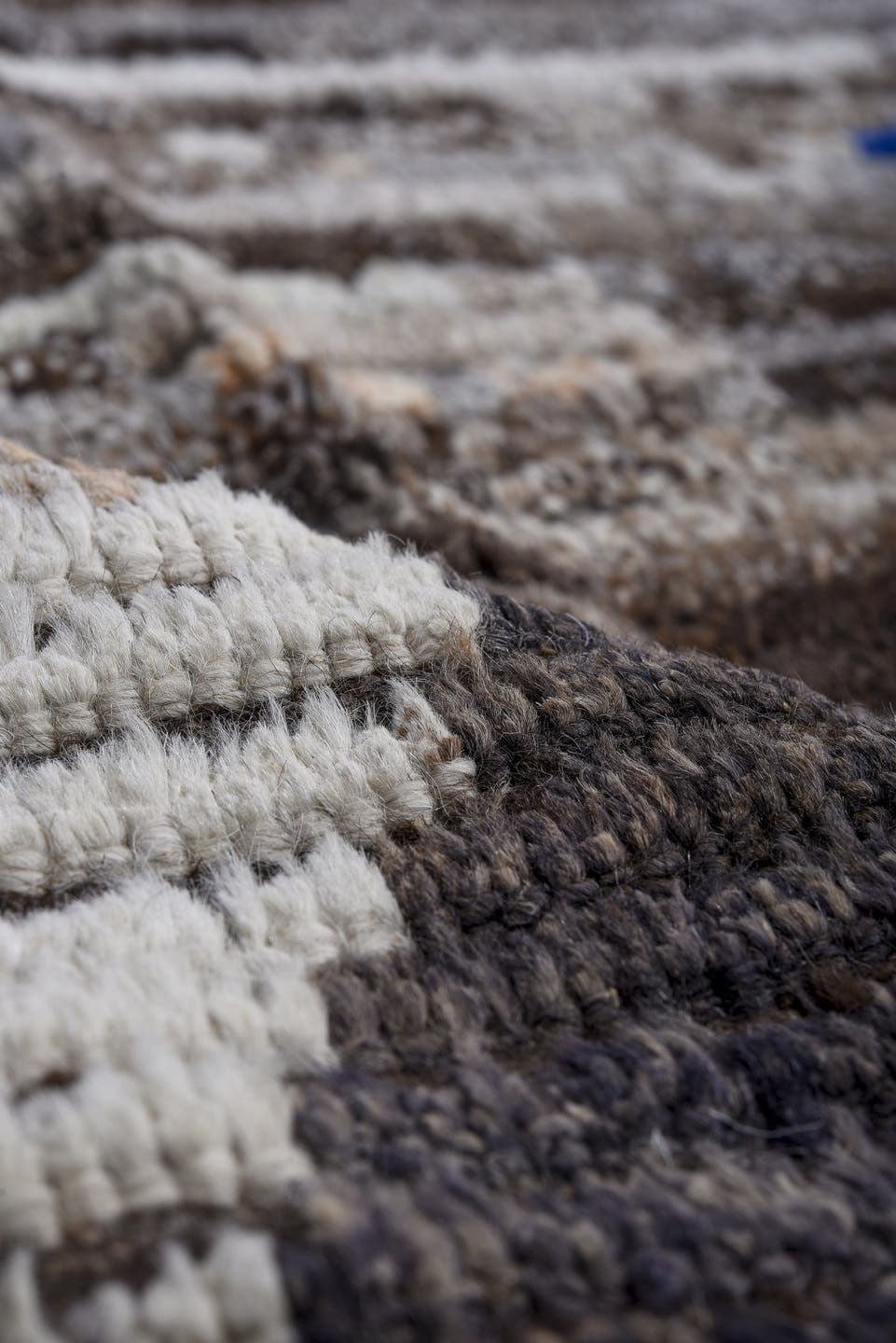 11' x 13' one-of-a-kind handmade vintage Tulu oversize rug. Color palette: brown, ivory, charcoal, sky blue, crimson, gray