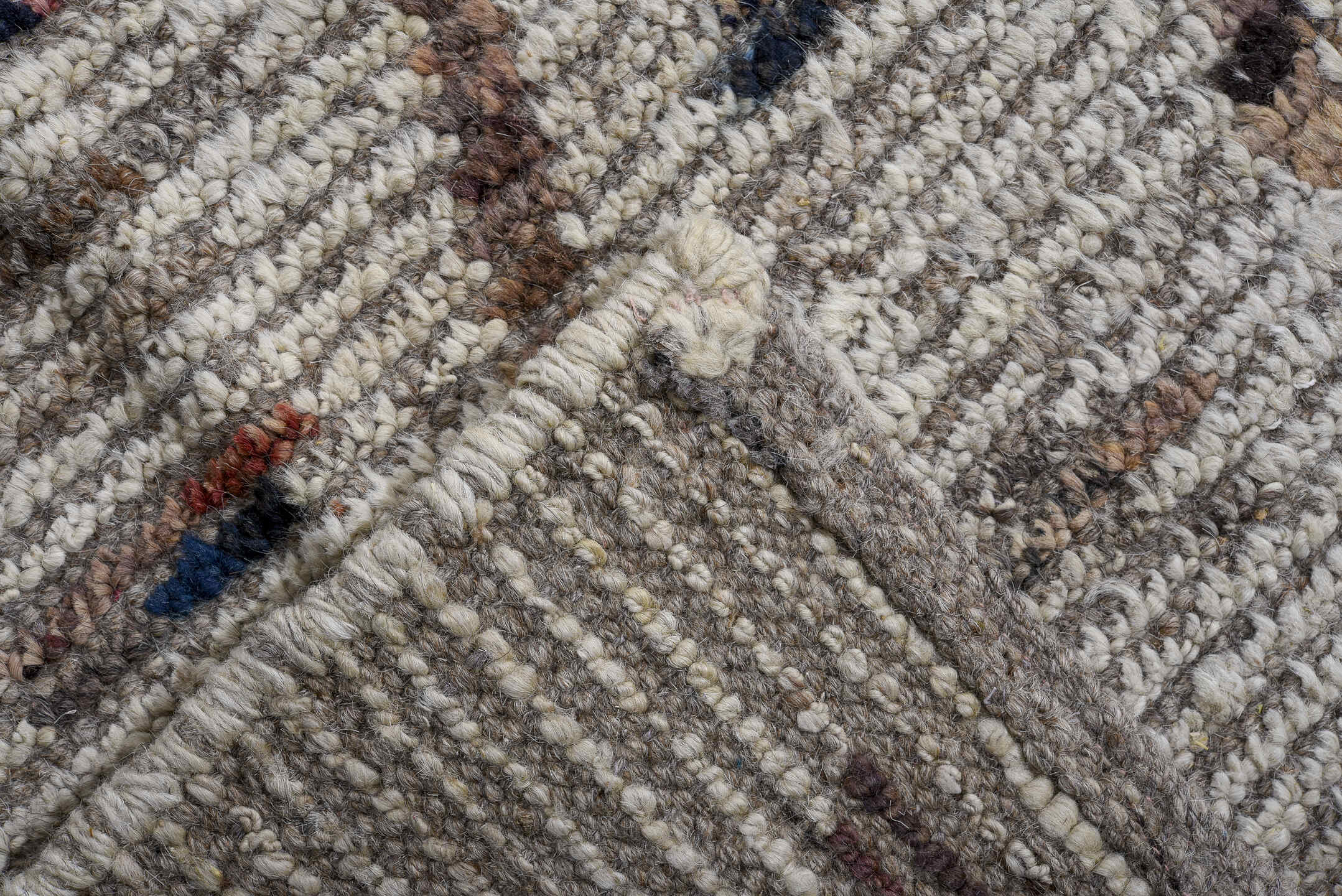 10' x 13' one-of-a-kind handmade vintage Tulu oversize rug. Color palette: ivory, taupe, brown, charcoal, rose, slate, beige