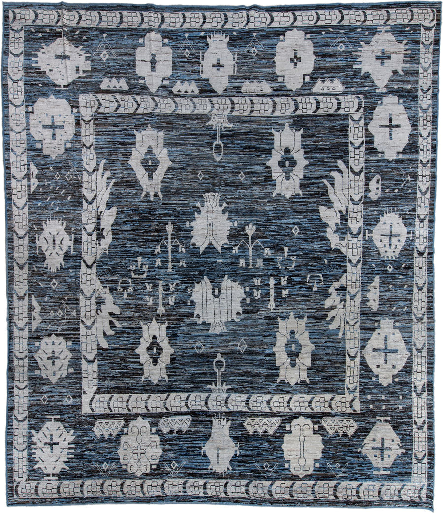 13' x 16' one-of-a-kind handmade vintage Tulu oversize rug. Color palette: charcoal, ivory, slate, steel blue, gray, black