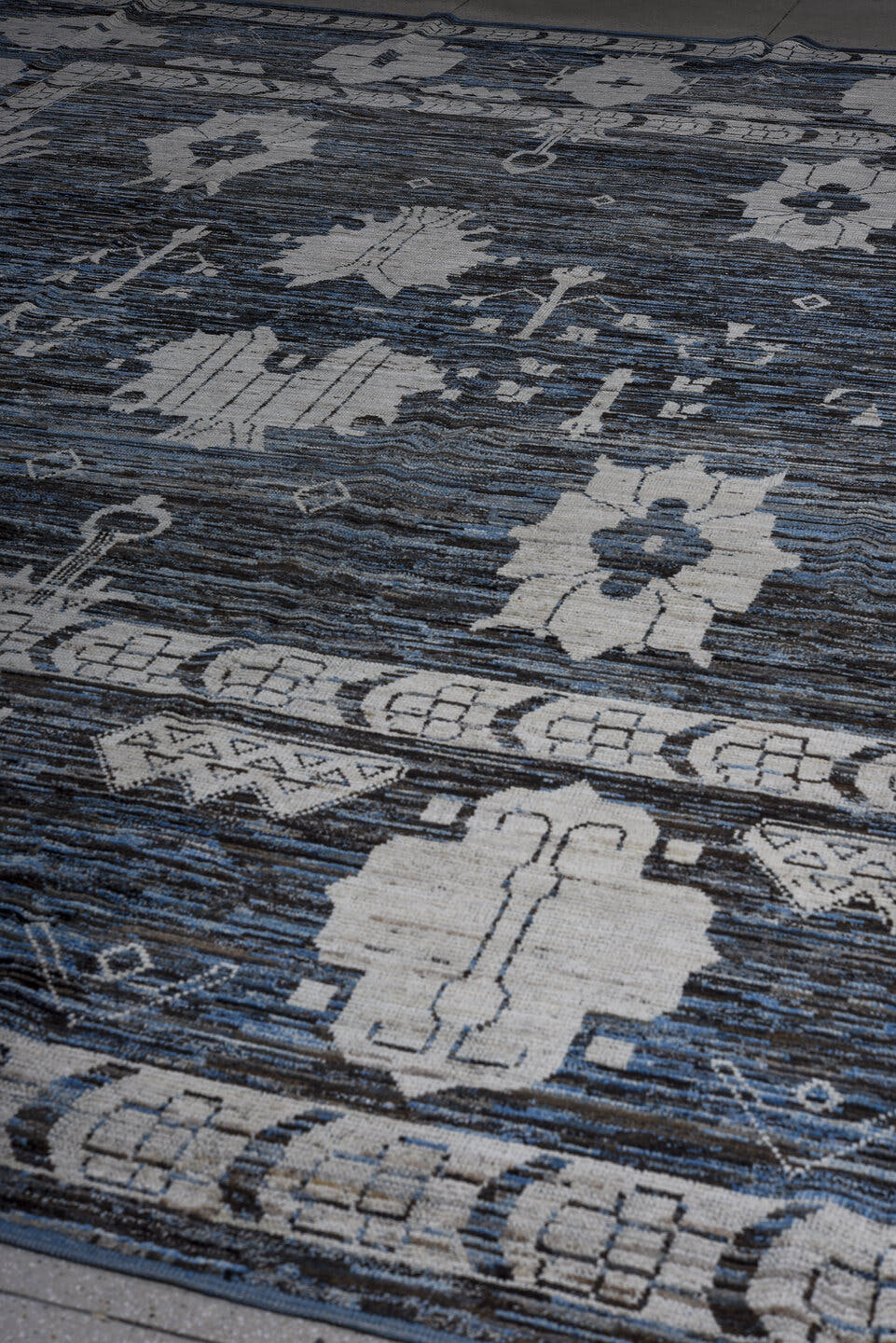 13' x 16' one-of-a-kind handmade vintage Tulu oversize rug. Color palette: charcoal, ivory, slate, steel blue, gray, black