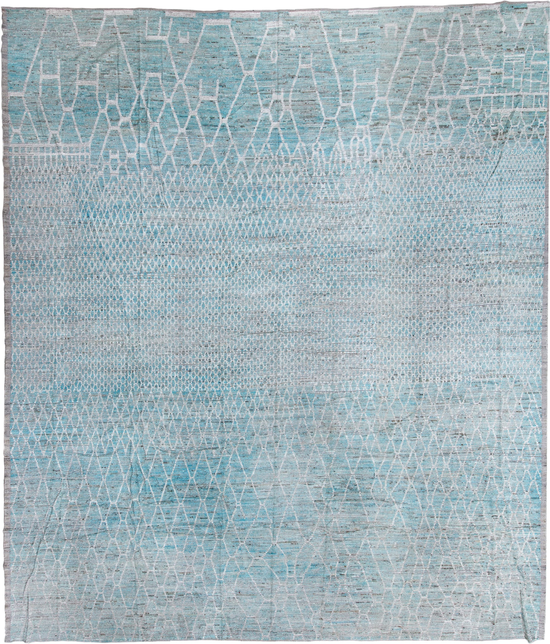 16' x 19' one-of-a-kind handmade vintage Tulu oversize rug. Color palette: pale blue, ivory, silver, gray, light blue