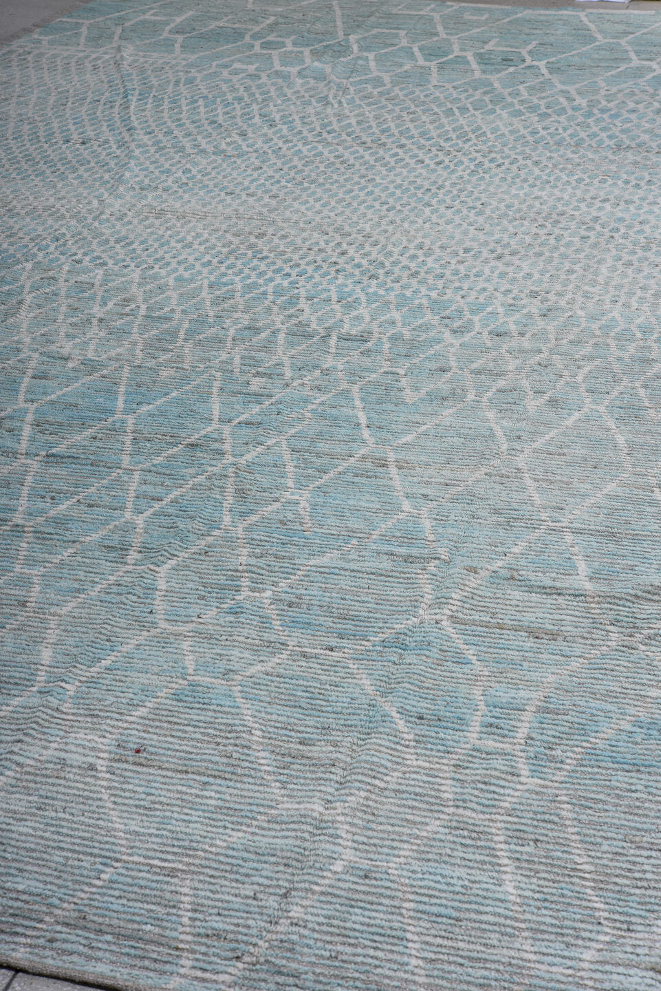 16' x 19' one-of-a-kind handmade vintage Tulu oversize rug. Color palette: pale blue, ivory, silver, gray, light blue