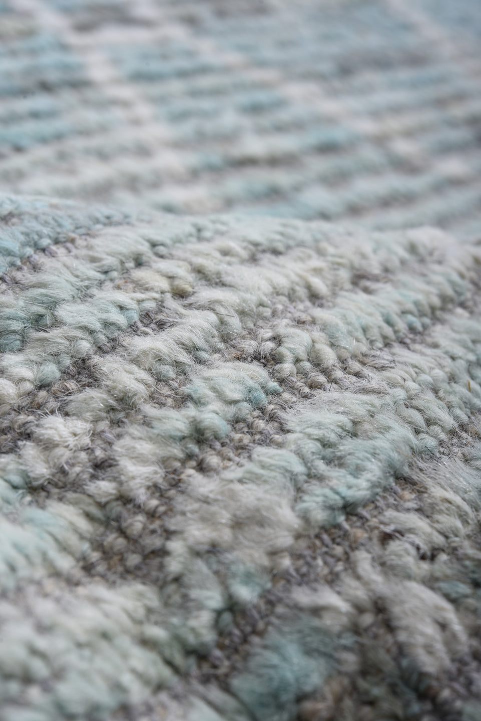 16' x 19' one-of-a-kind handmade vintage Tulu oversize rug. Color palette: pale blue, ivory, silver, gray, light blue