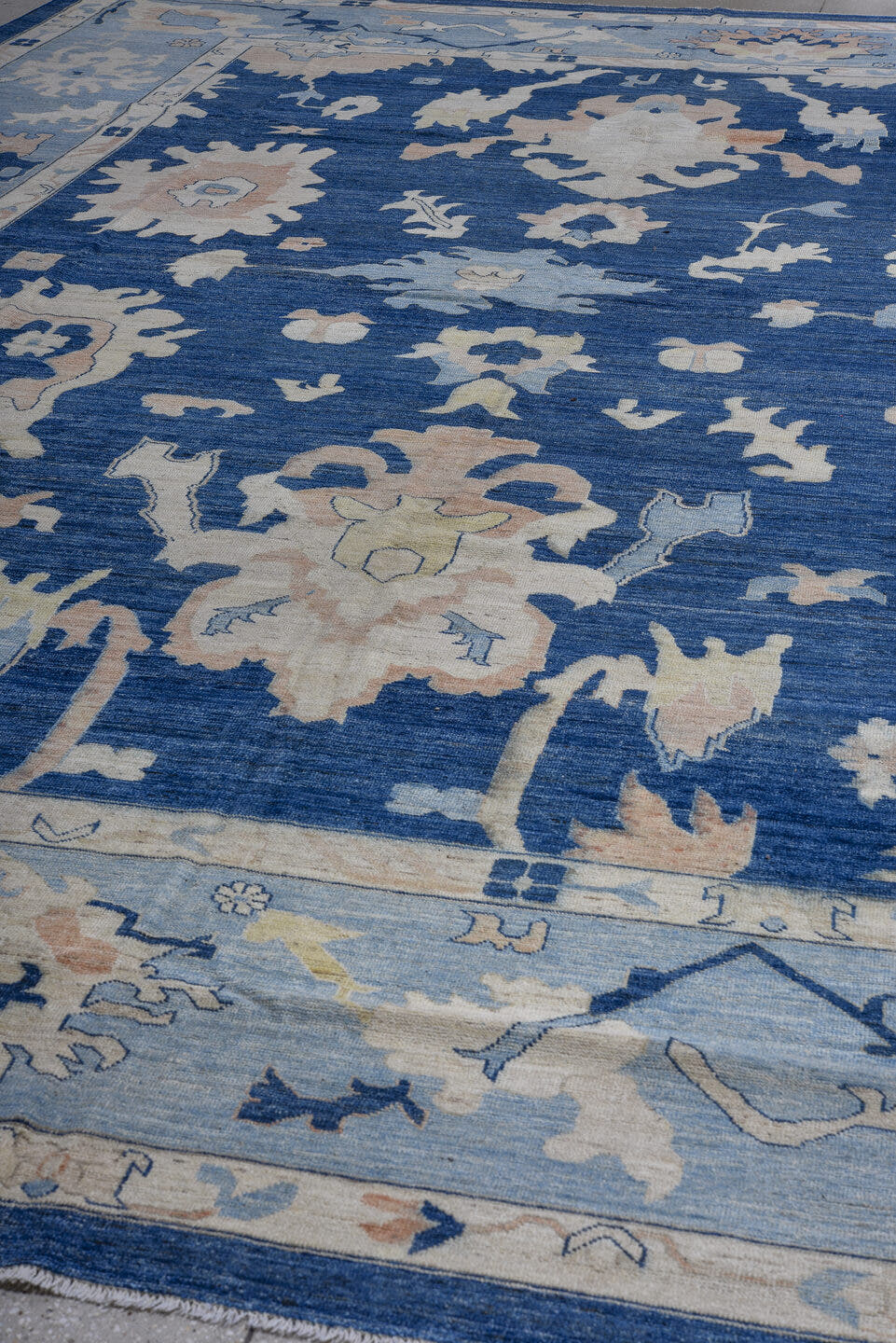 13' x 19' one-of-a-kind handmade vintage Oushak oversize rug. Color palette: navy, sky blue, ivory, blush, cream, beige