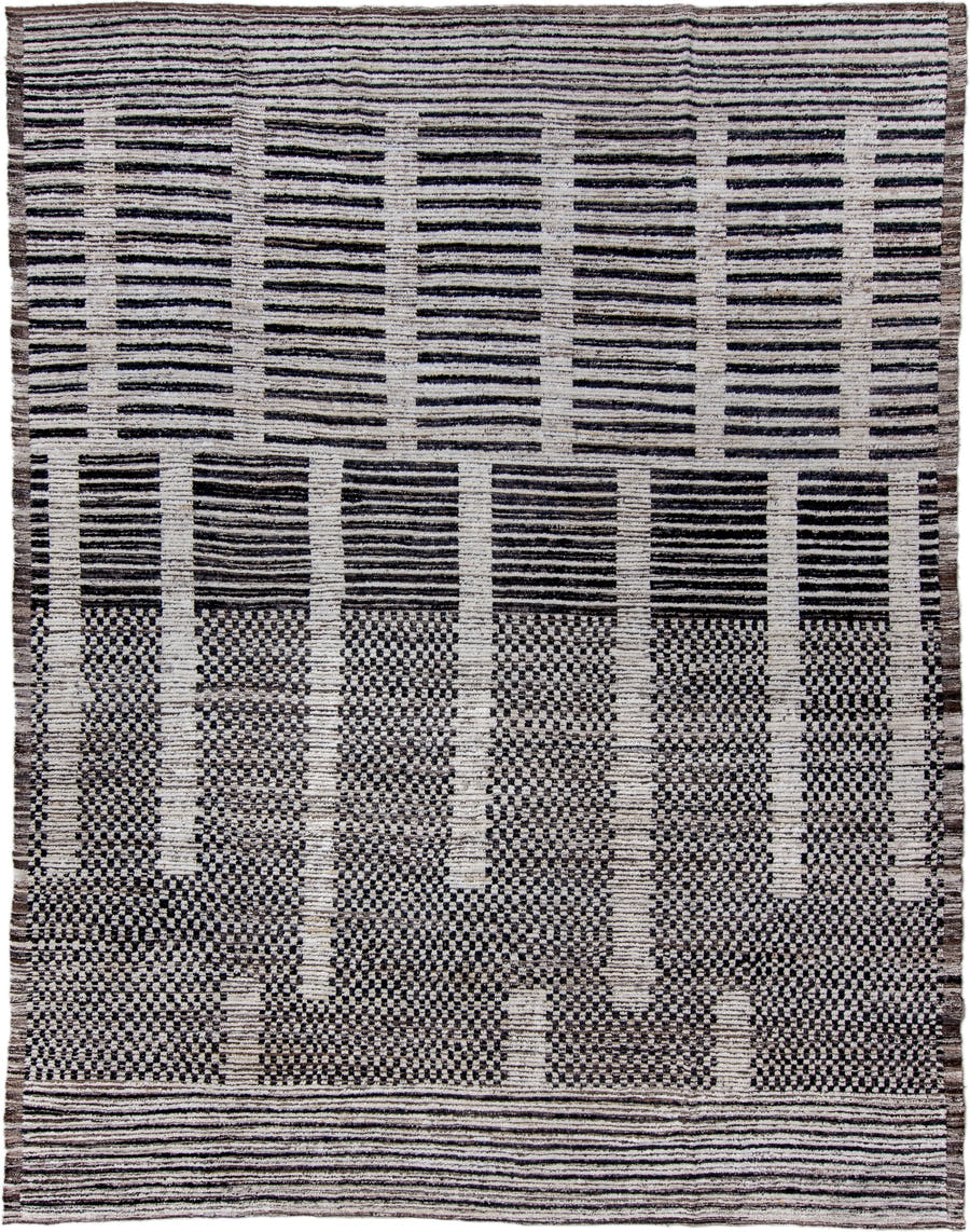 9' x 12' one-of-a-kind handmade vintage Tulu large size rug. Color palette: ivory, charcoal, brown, taupe, gray, black