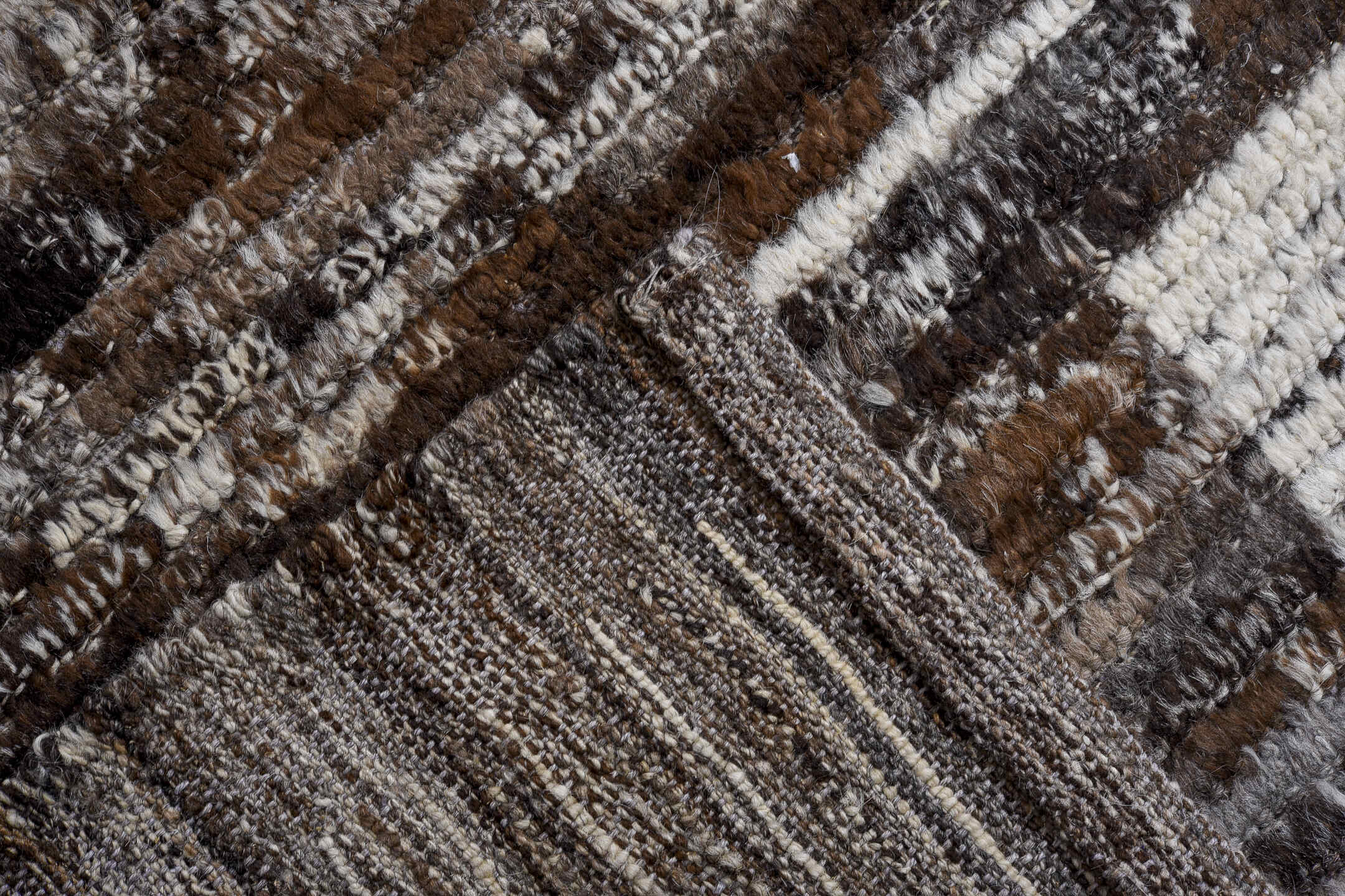 13' x 16' one-of-a-kind handmade vintage Tulu oversize rug. Color palette: charcoal, ivory, taupe, brown, slate, gray, black