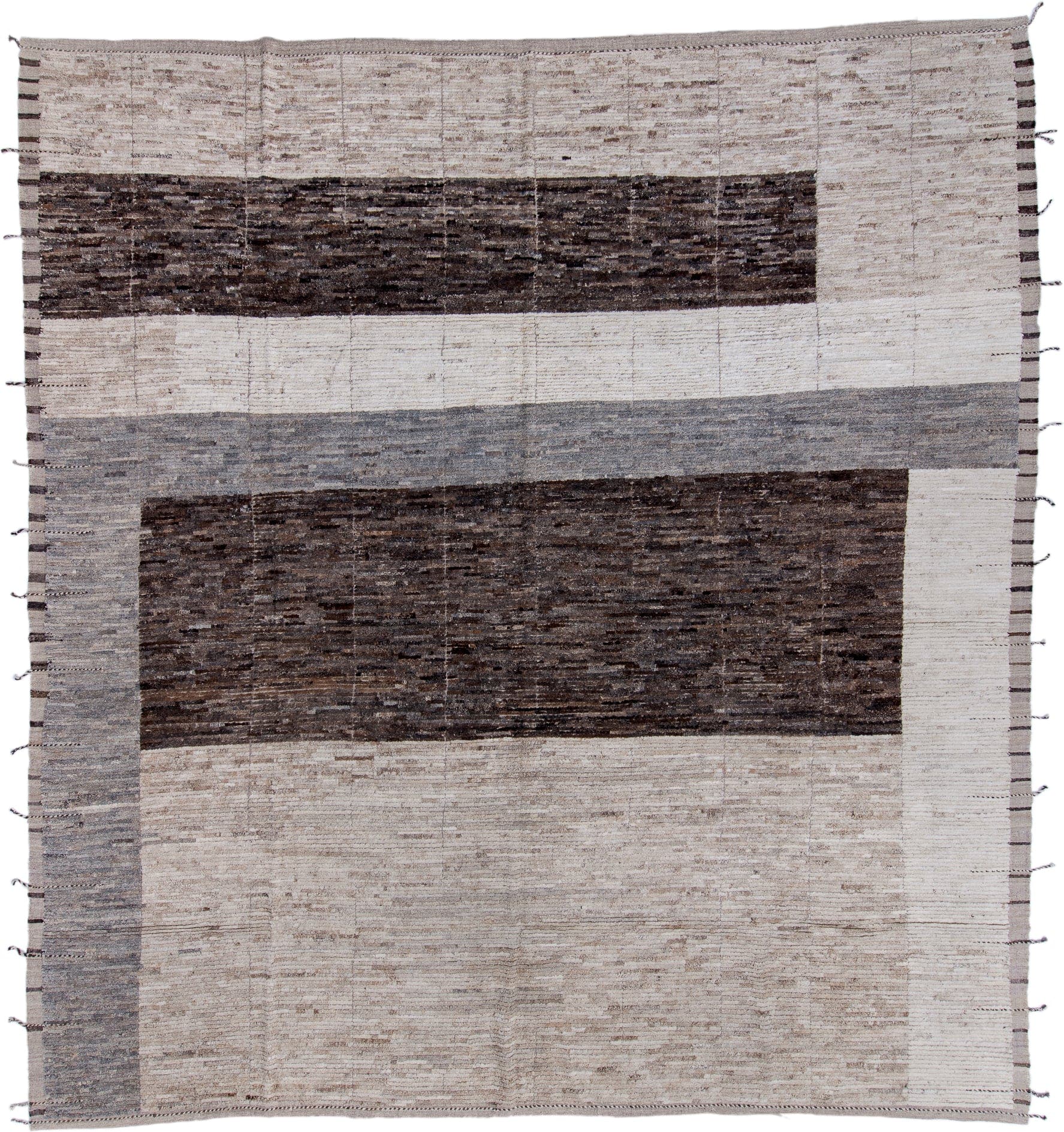 13' x 14' one-of-a-kind handmade vintage Tulu oversize rug. Color palette: ivory, charcoal, taupe, gray, brown, black, beige