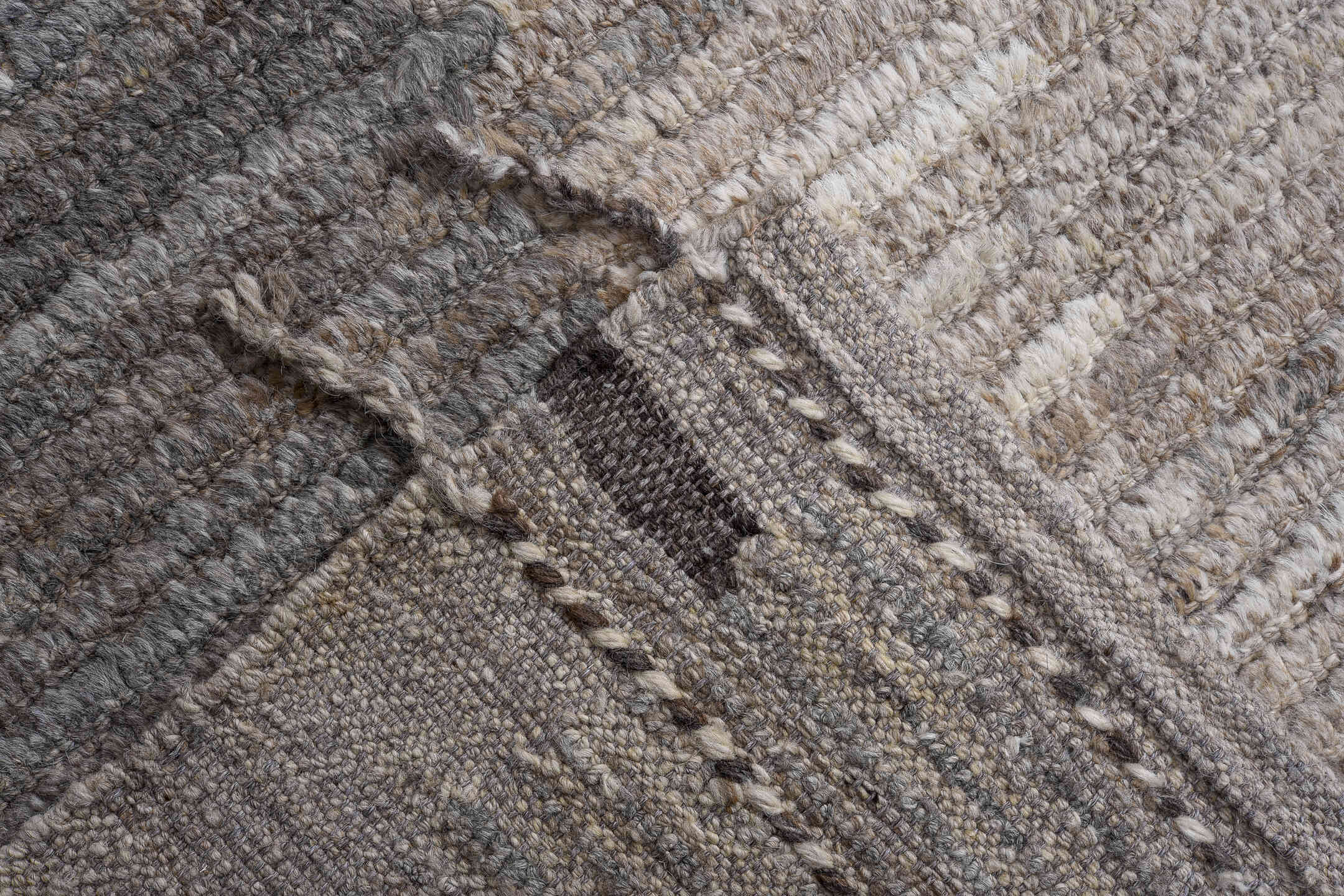 13' x 14' one-of-a-kind handmade vintage Tulu oversize rug. Color palette: ivory, charcoal, taupe, gray, brown, black, beige