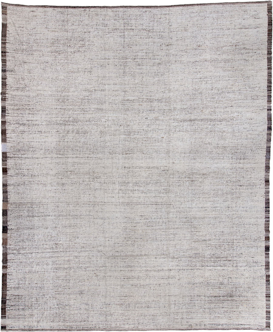 13' x 16' one-of-a-kind handmade vintage Tulu oversize rug. Color palette: ivory, charcoal, taupe, brown, gray, black, beige