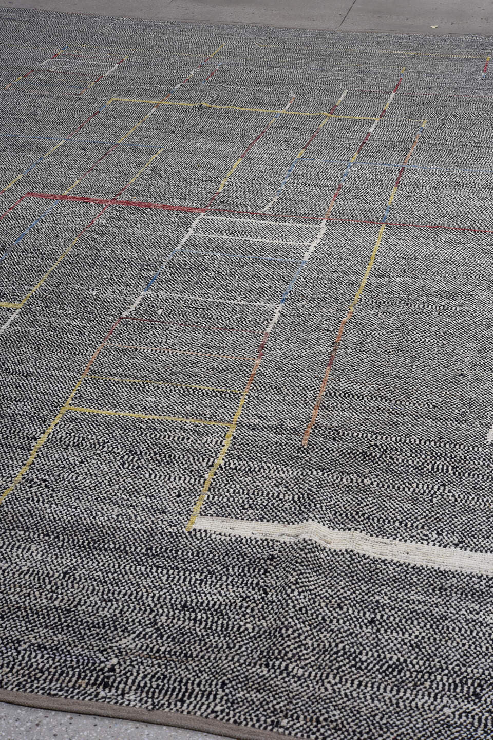 11' x 14' one-of-a-kind handmade vintage Tulu oversize rug. Color palette: charcoal, ivory, saffron, crimson, blue, taupe