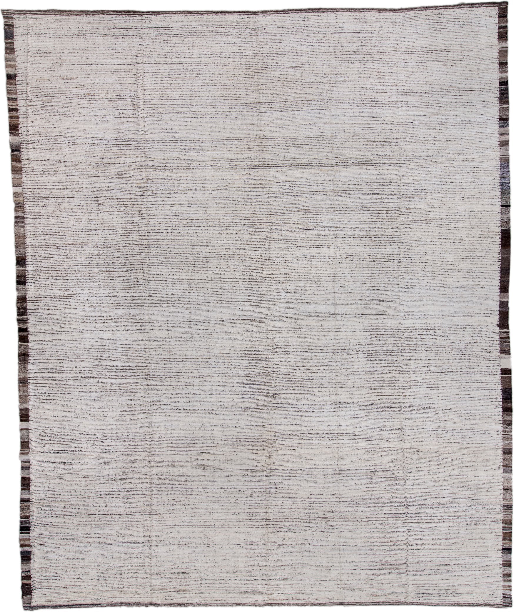 13' x 16' one-of-a-kind handmade vintage Tulu oversize rug. Color palette: ivory, charcoal, taupe, brown, gray, black, beige
