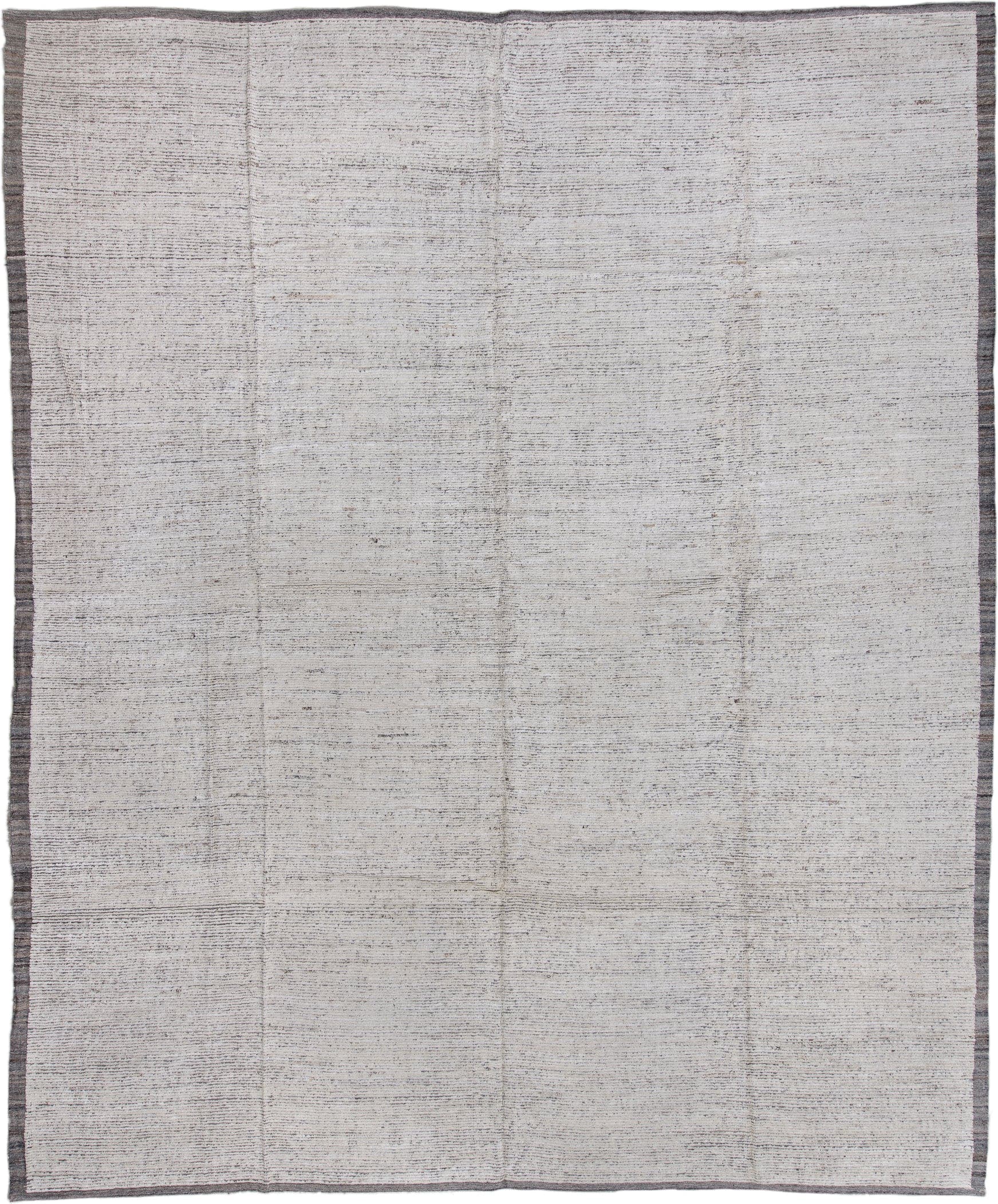 12' x 15' one-of-a-kind handmade vintage Tulu oversize rug. Color palette: ivory, charcoal, taupe, gray, black, beige