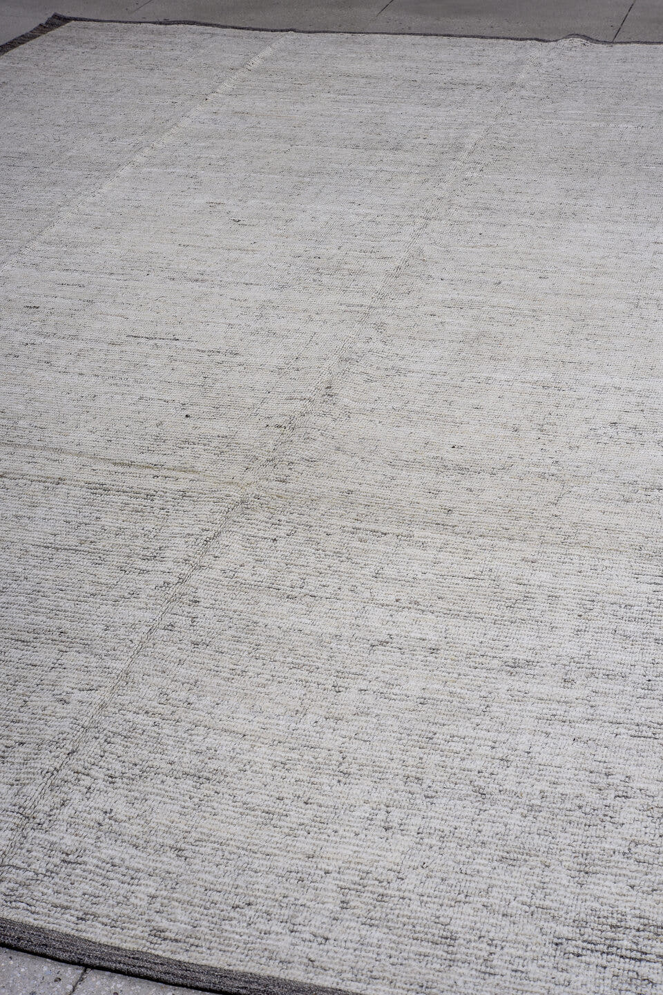 12' x 15' one-of-a-kind handmade vintage Tulu oversize rug. Color palette: ivory, charcoal, taupe, gray, black, beige