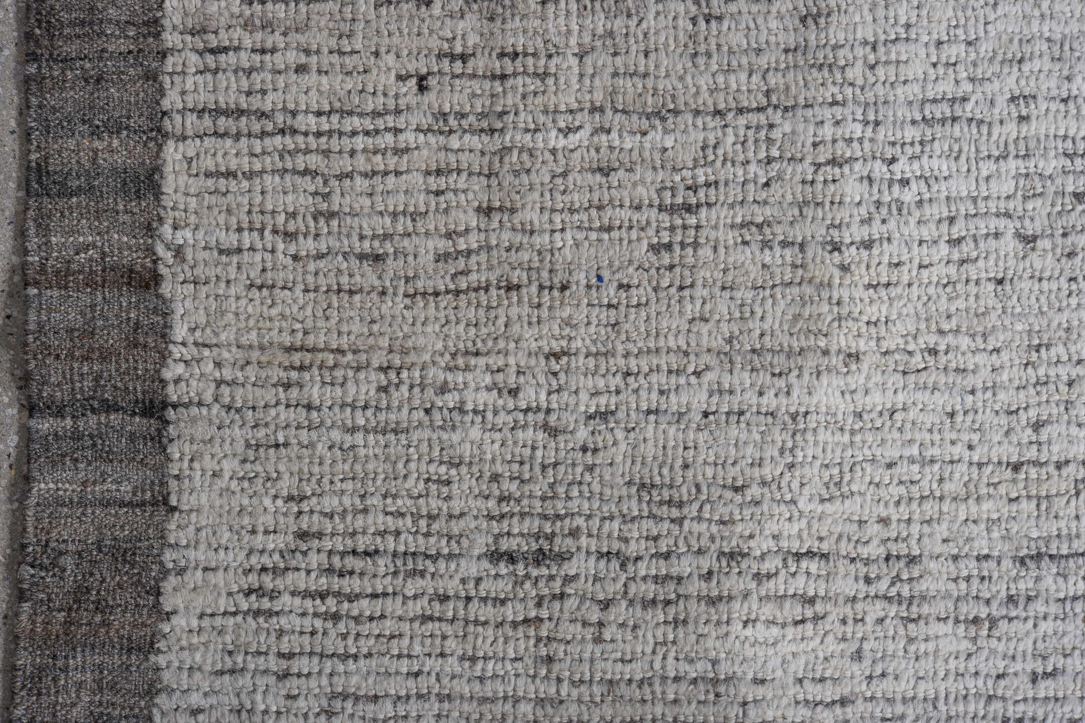 12' x 15' one-of-a-kind handmade vintage Tulu oversize rug. Color palette: ivory, charcoal, taupe, gray, black, beige
