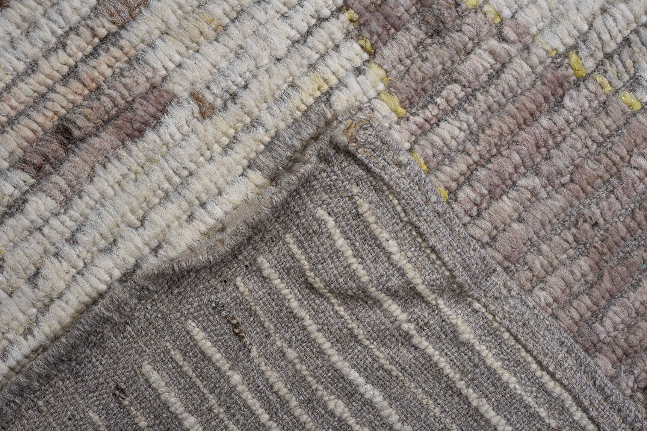 8' x 11' one-of-a-kind handmade vintage Tulu large size rug. Color palette: ivory, taupe, camel, rose, blue, yellow, gray