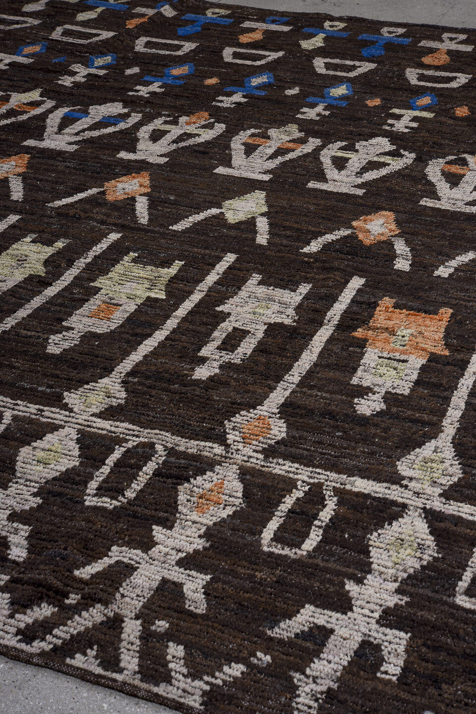 9' x 11' one-of-a-kind handmade vintage Tulu large size rug. Color palette: charcoal, ivory, cobalt, rust, taupe, gray