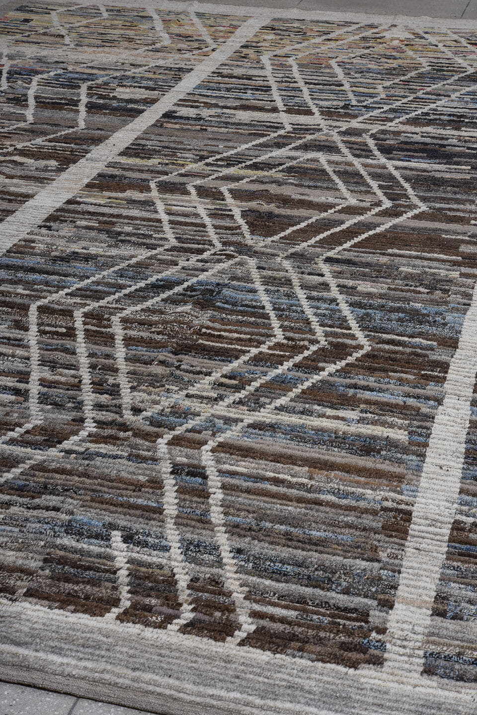 13' x 17' one-of-a-kind handmade vintage Tulu oversize rug. Color palette: taupe, ivory, charcoal, brown, slate, sky blue