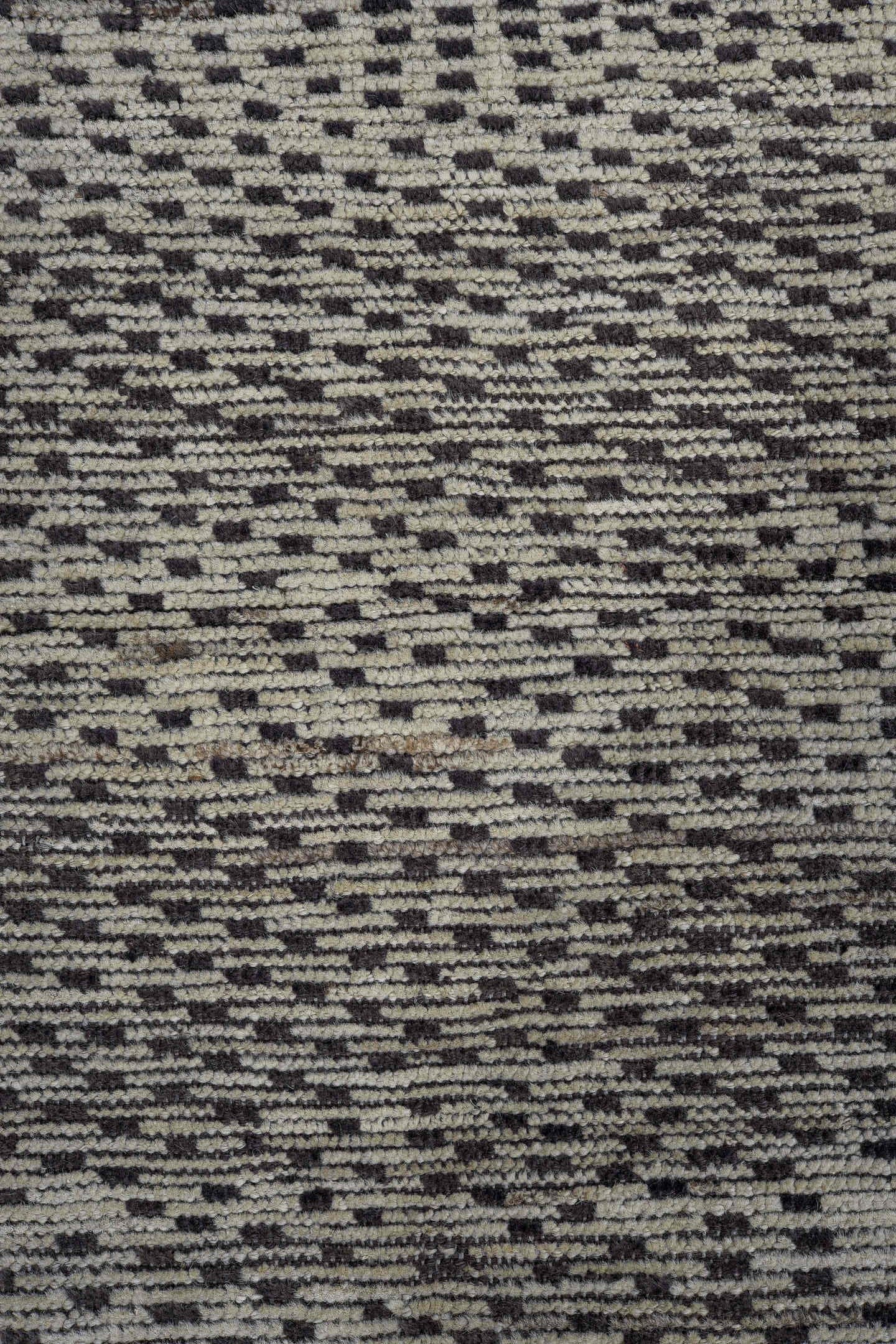 4' x 7' one-of-a-kind handmade vintage Tulu rug. Color palette: ivory, charcoal, gray, black