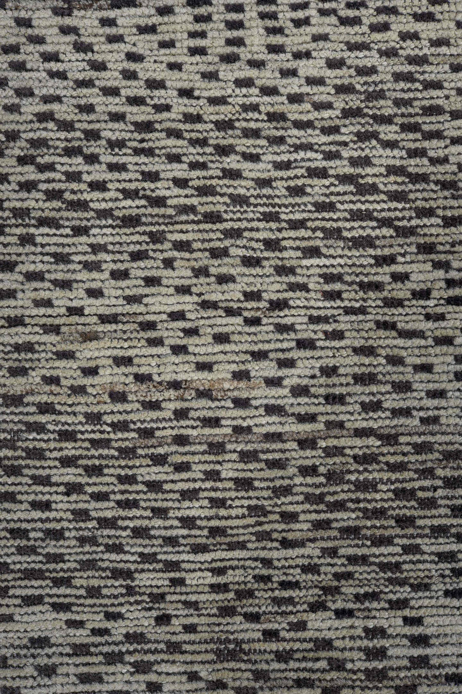 4' x 7' one-of-a-kind handmade vintage Tulu rug. Color palette: ivory, charcoal, gray, black