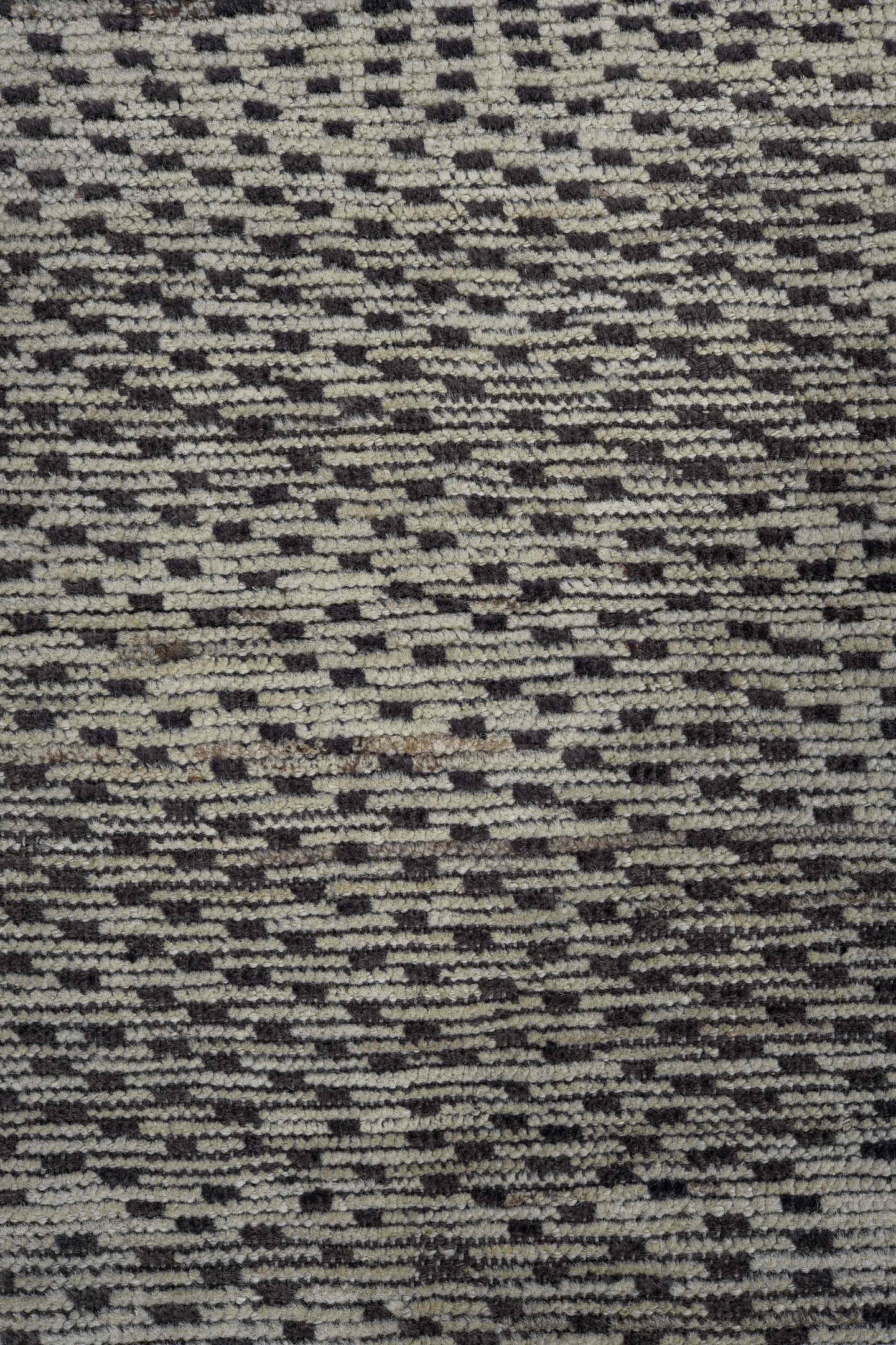 4' x 7' one-of-a-kind handmade vintage Tulu rug. Color palette: ivory, charcoal, gray, black