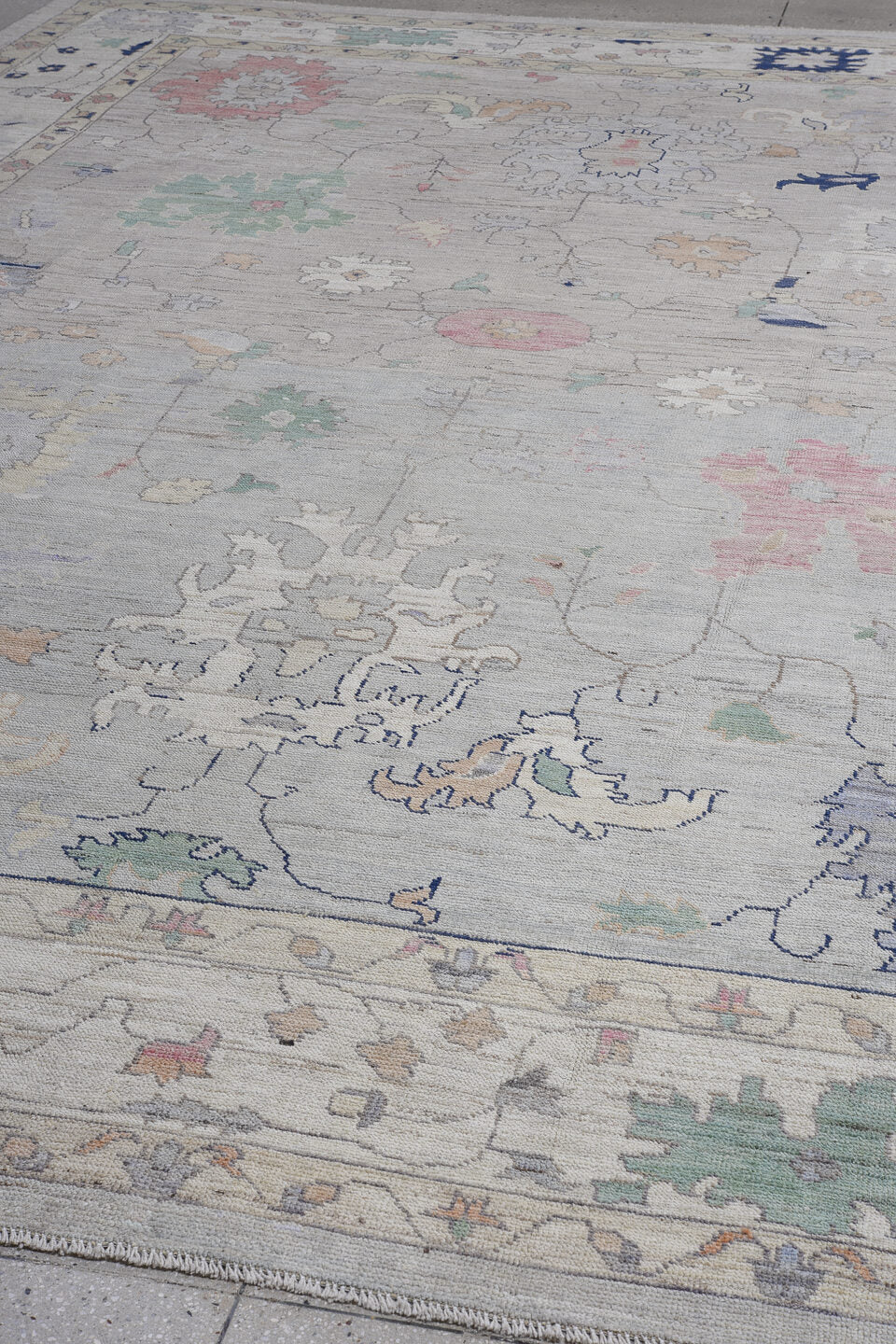 11' x 16' one-of-a-kind handmade vintage Oushak oversize rug. Color palette: gray, ivory, mint, blush, lavender, navy, taupe