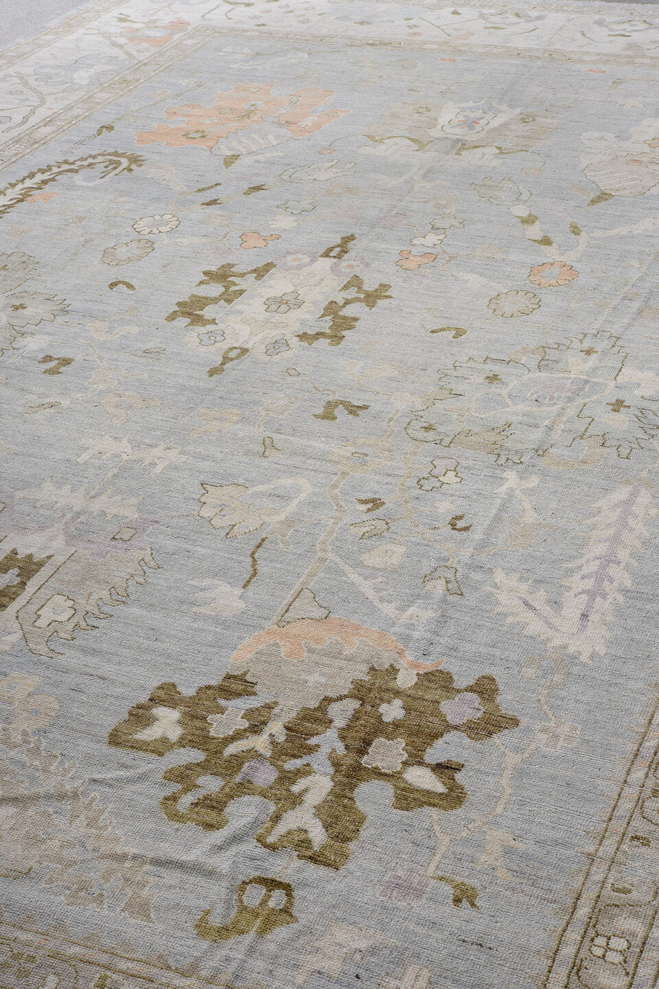 13' x 19' one-of-a-kind handmade vintage Oushak oversize rug. Color palette: pale blue, ivory, taupe, lavender, blush, sage