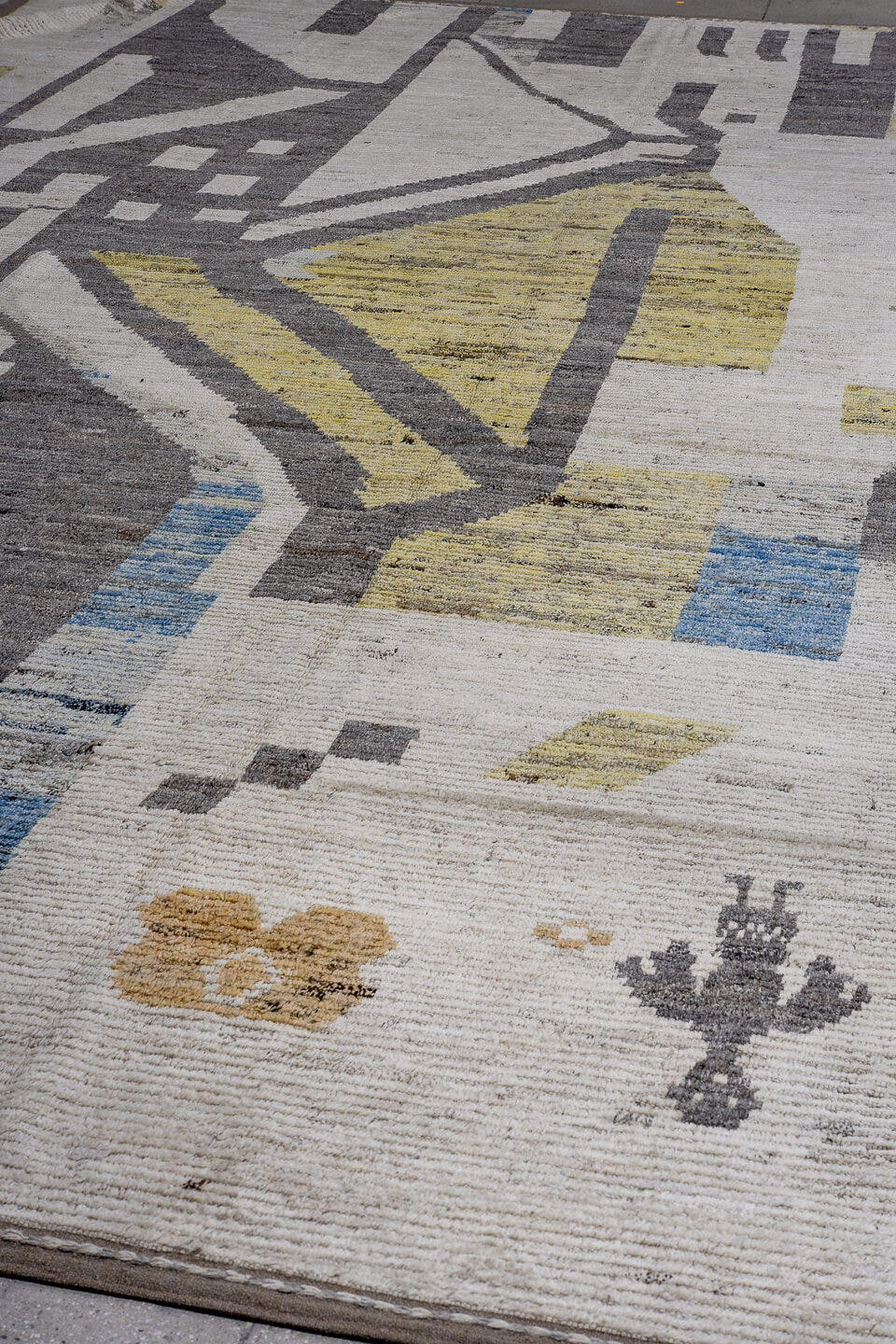 13' x 19' one-of-a-kind handmade vintage Tulu oversize rug. Color palette: ivory, charcoal, gold, blue, taupe, camel, gray