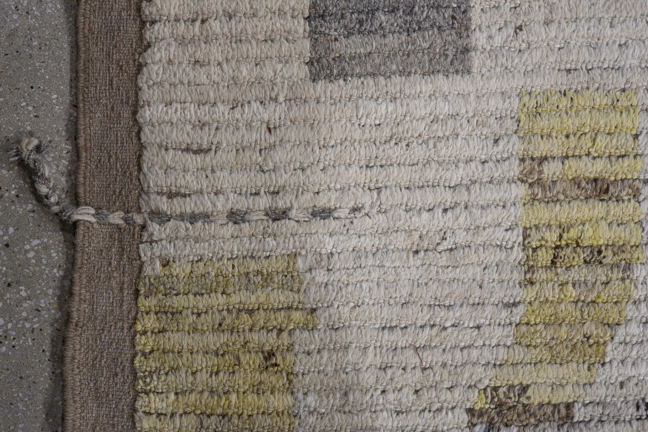 13' x 19' one-of-a-kind handmade vintage Tulu oversize rug. Color palette: ivory, charcoal, gold, blue, taupe, camel, gray