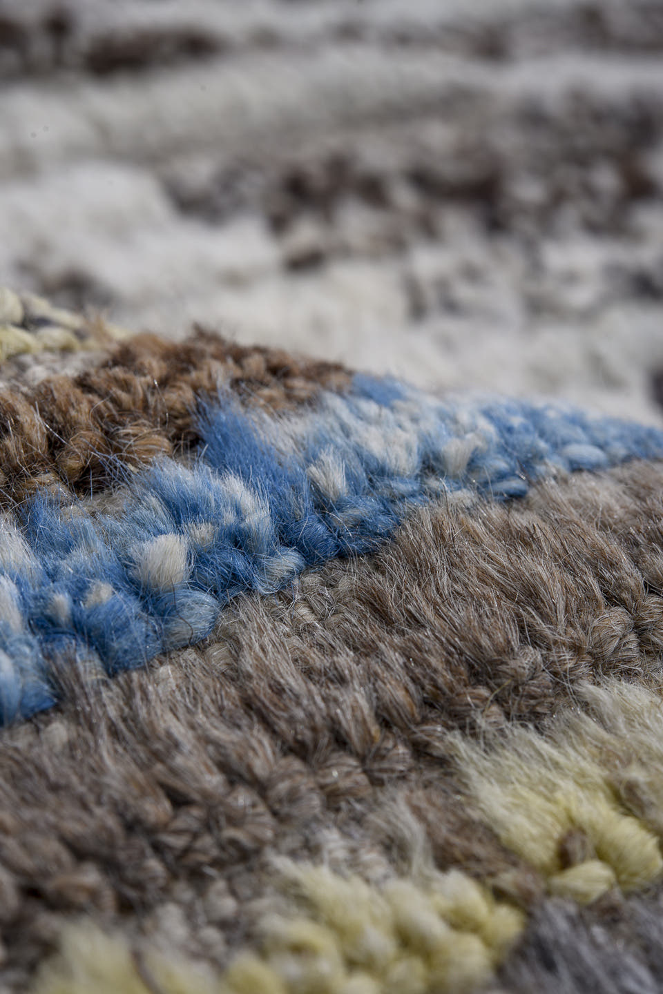 13' x 15' one-of-a-kind handmade vintage Tulu oversize rug. Color palette: ivory, gray, blue, charcoal, taupe, gold, sage