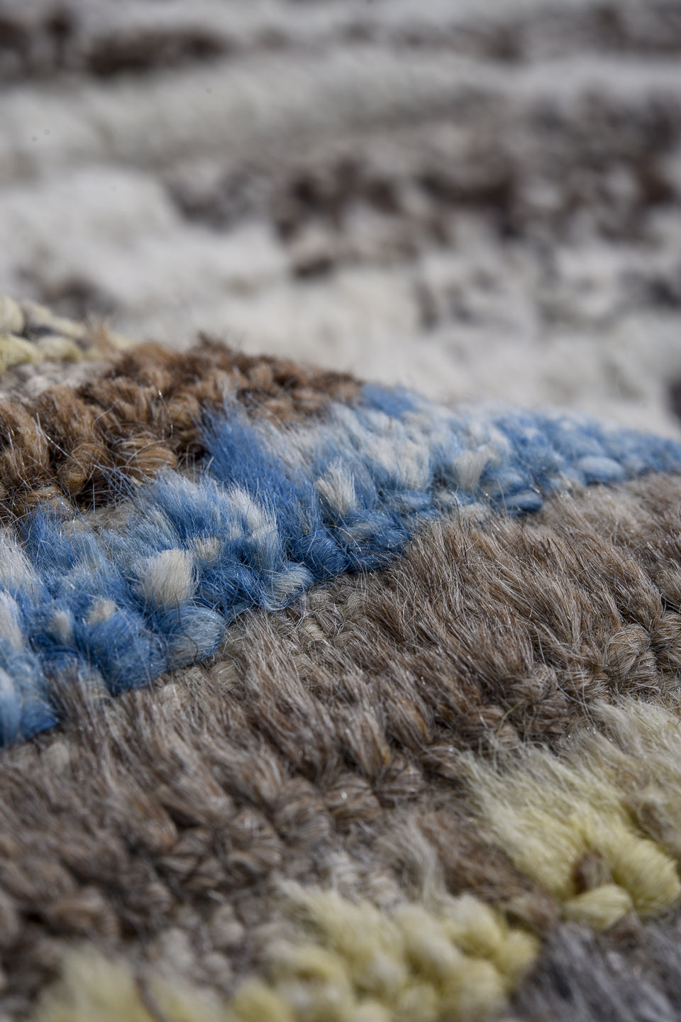 13' x 15' one-of-a-kind handmade vintage Tulu oversize rug. Color palette: ivory, gray, blue, charcoal, taupe, gold, sage