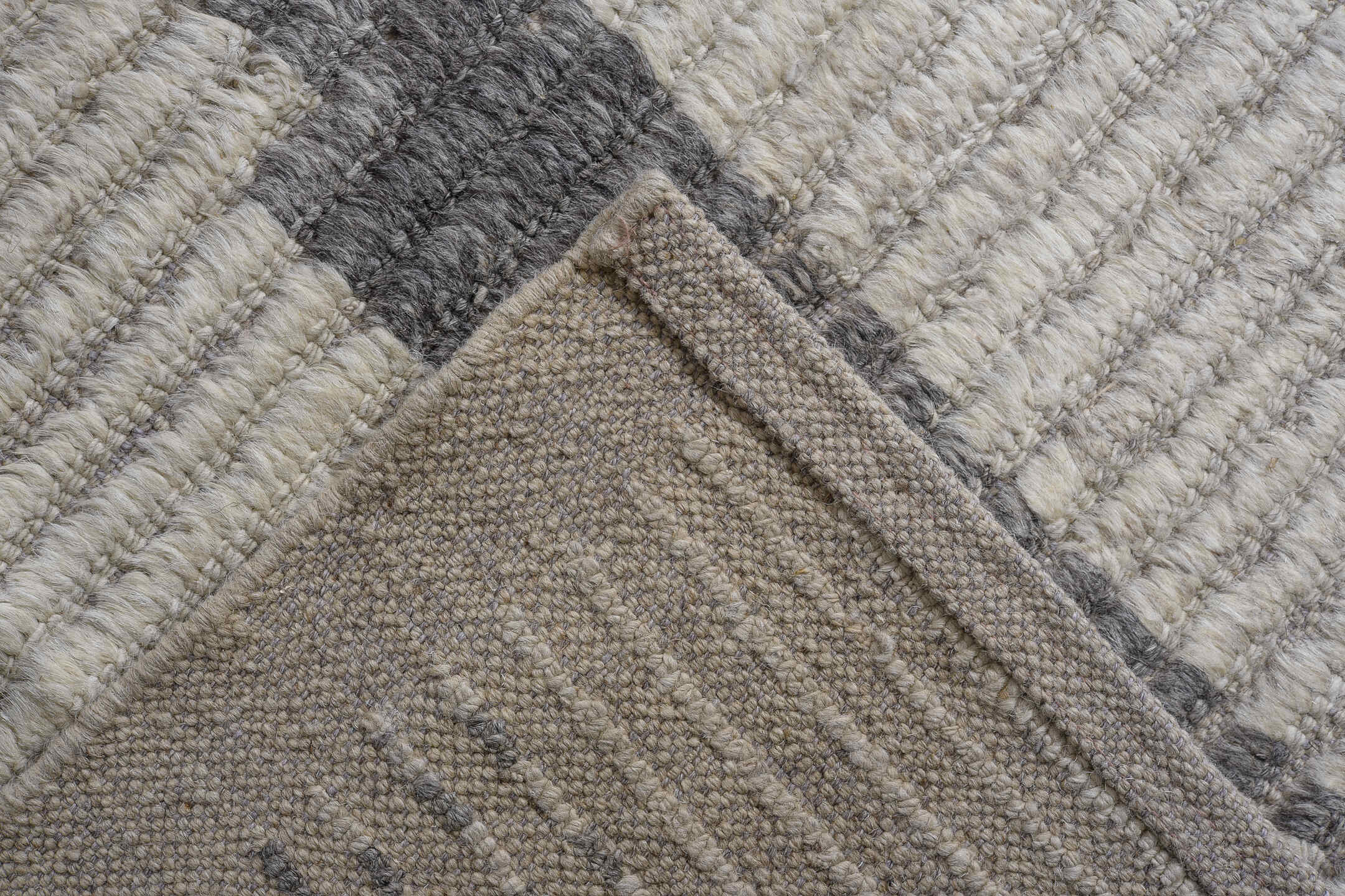 13' x 16' one-of-a-kind handmade vintage Tulu oversize rug. Color palette: ivory, charcoal, taupe, slate, gray, black, beige