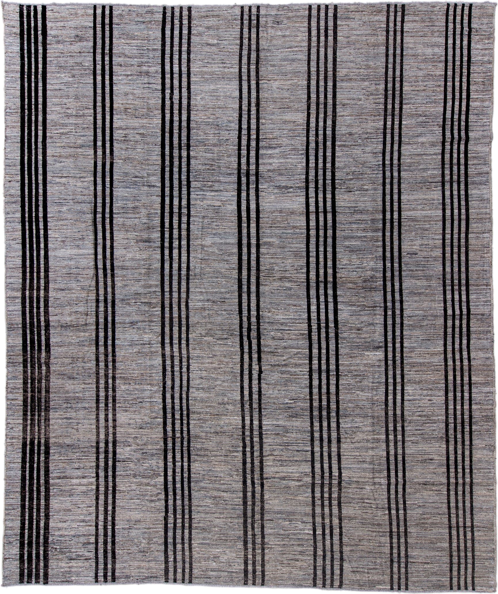 12' x 14' one-of-a-kind handmade vintage Tulu oversize rug. Color palette: gray, charcoal, black, ivory