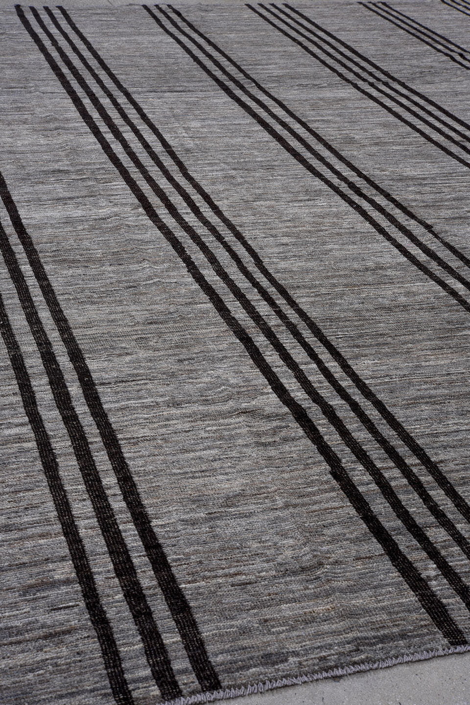 12' x 14' one-of-a-kind handmade vintage Tulu oversize rug. Color palette: gray, charcoal, black, ivory